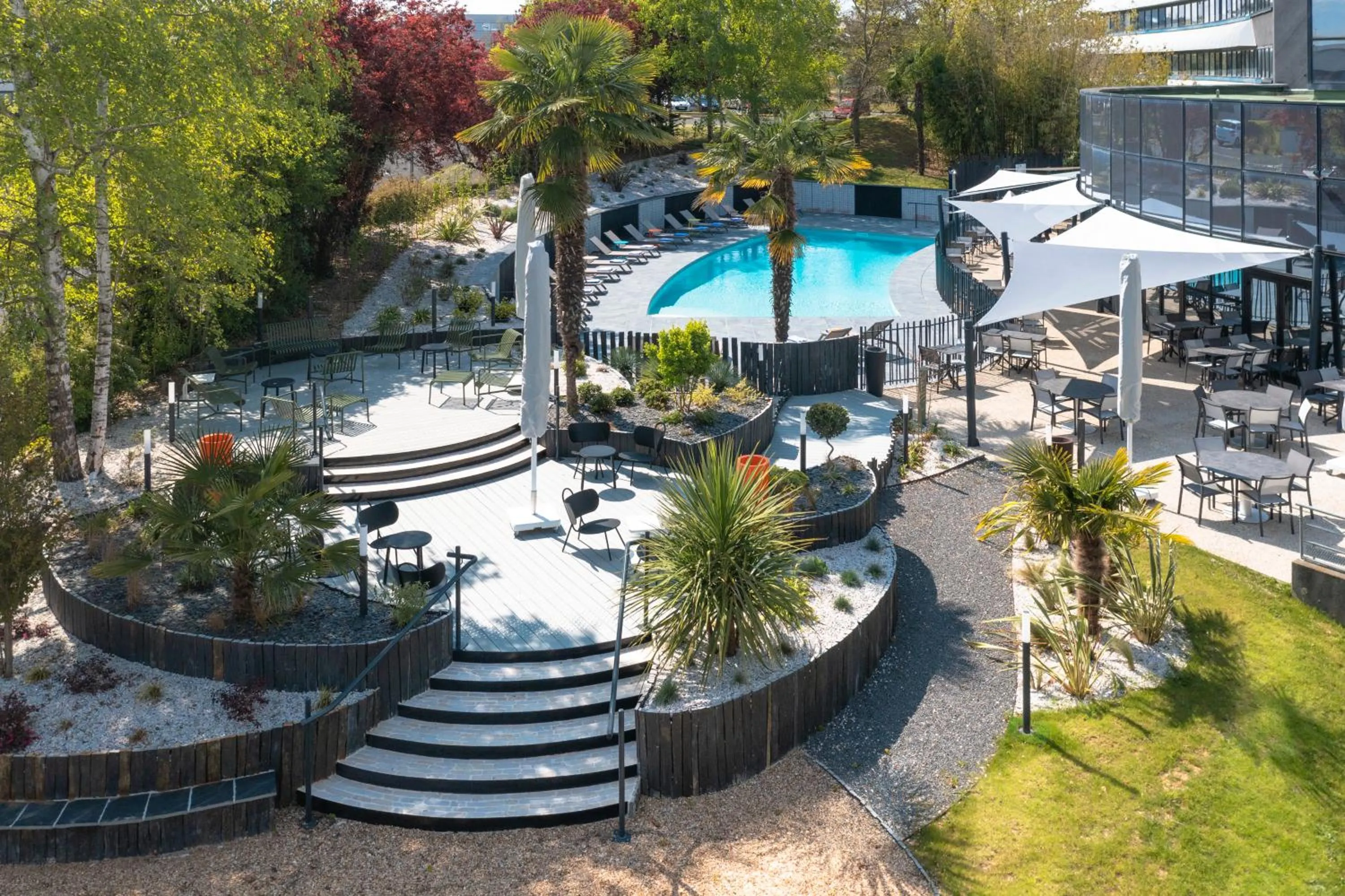 Pool view in Novotel Poitiers Site du Futuroscope
