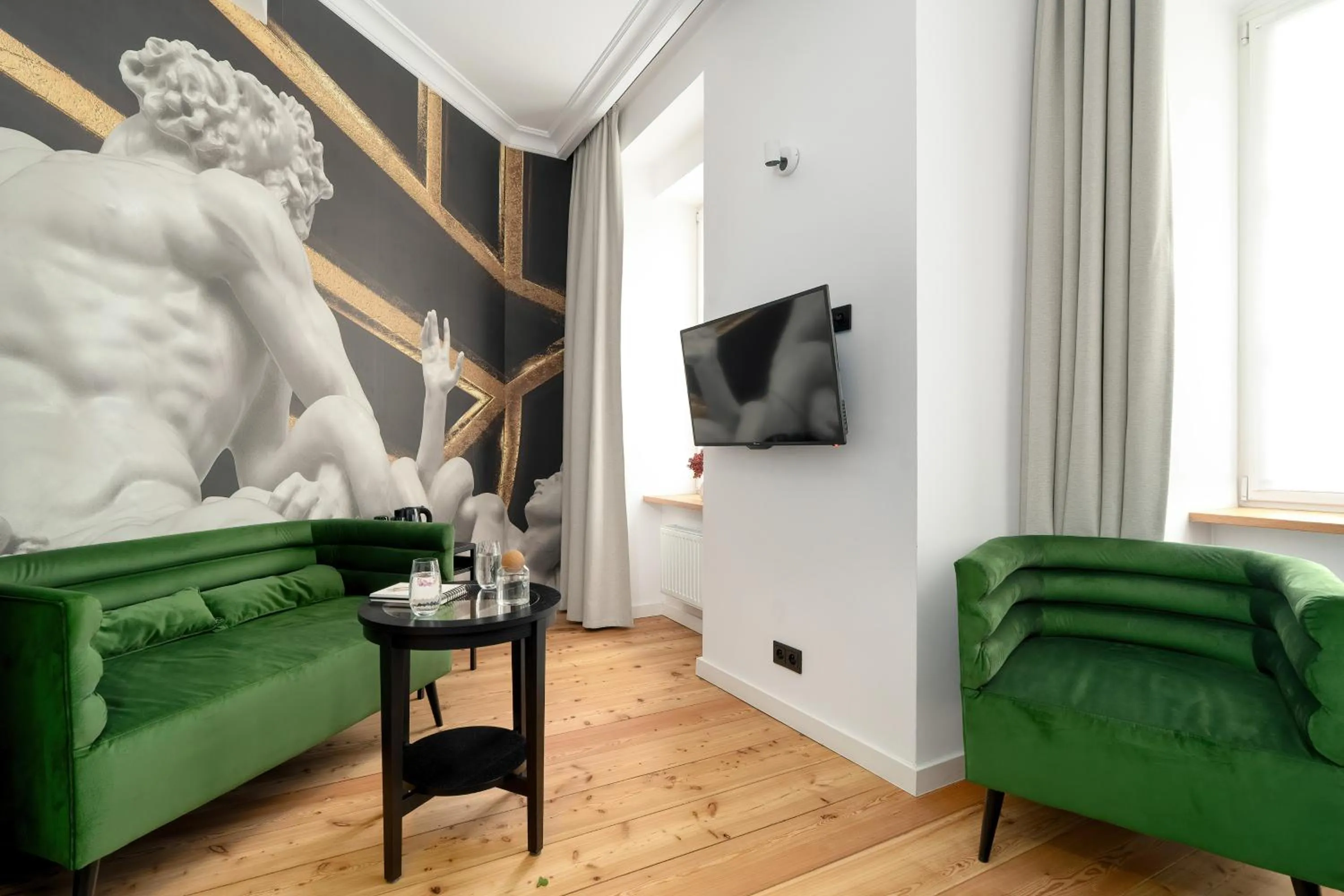 TV and multimedia in Apartamenty Schoeps Residence by Noclegi Renters