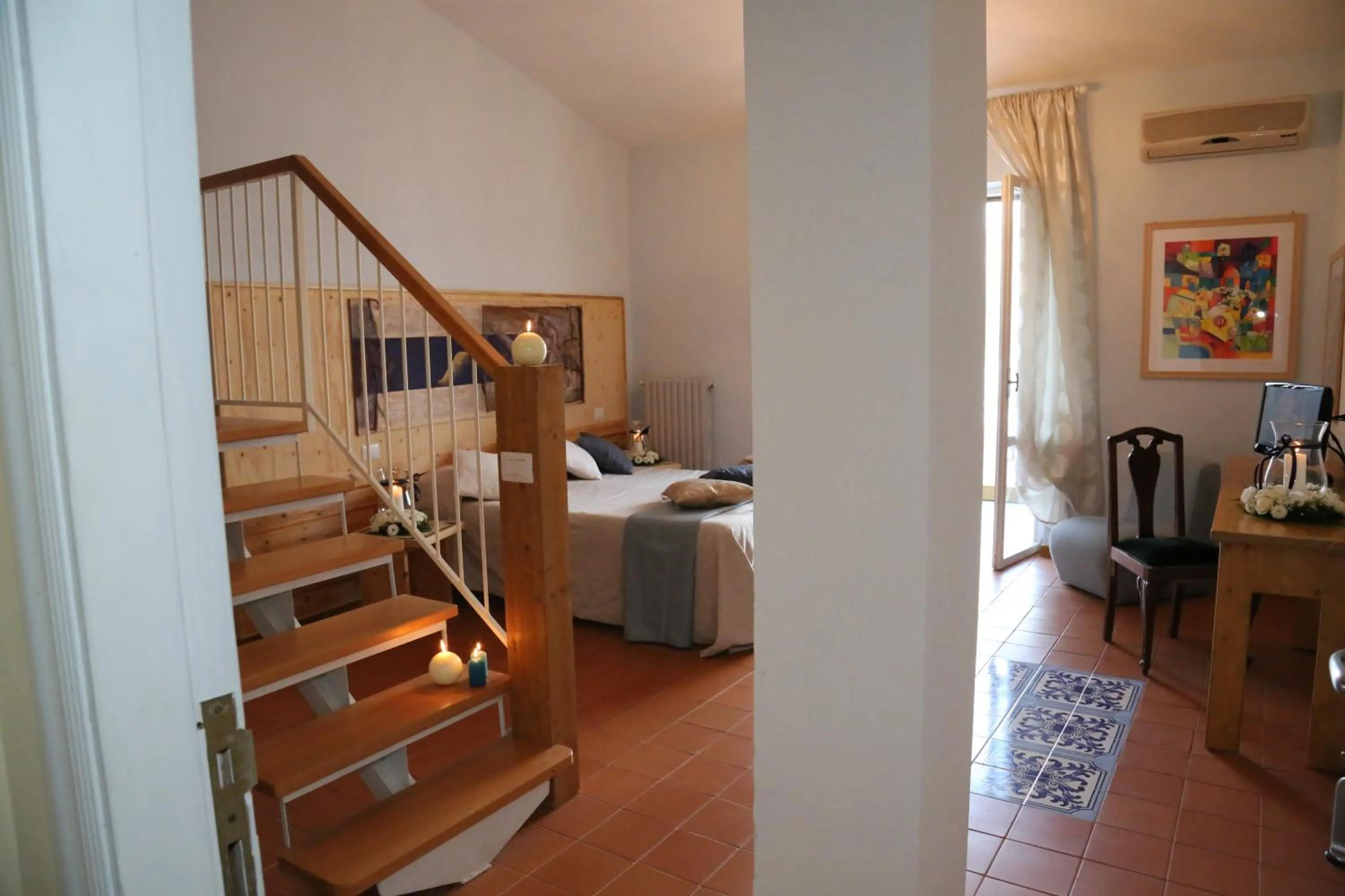 Seating area, Bed in Albergo Ristorante Cavaliere