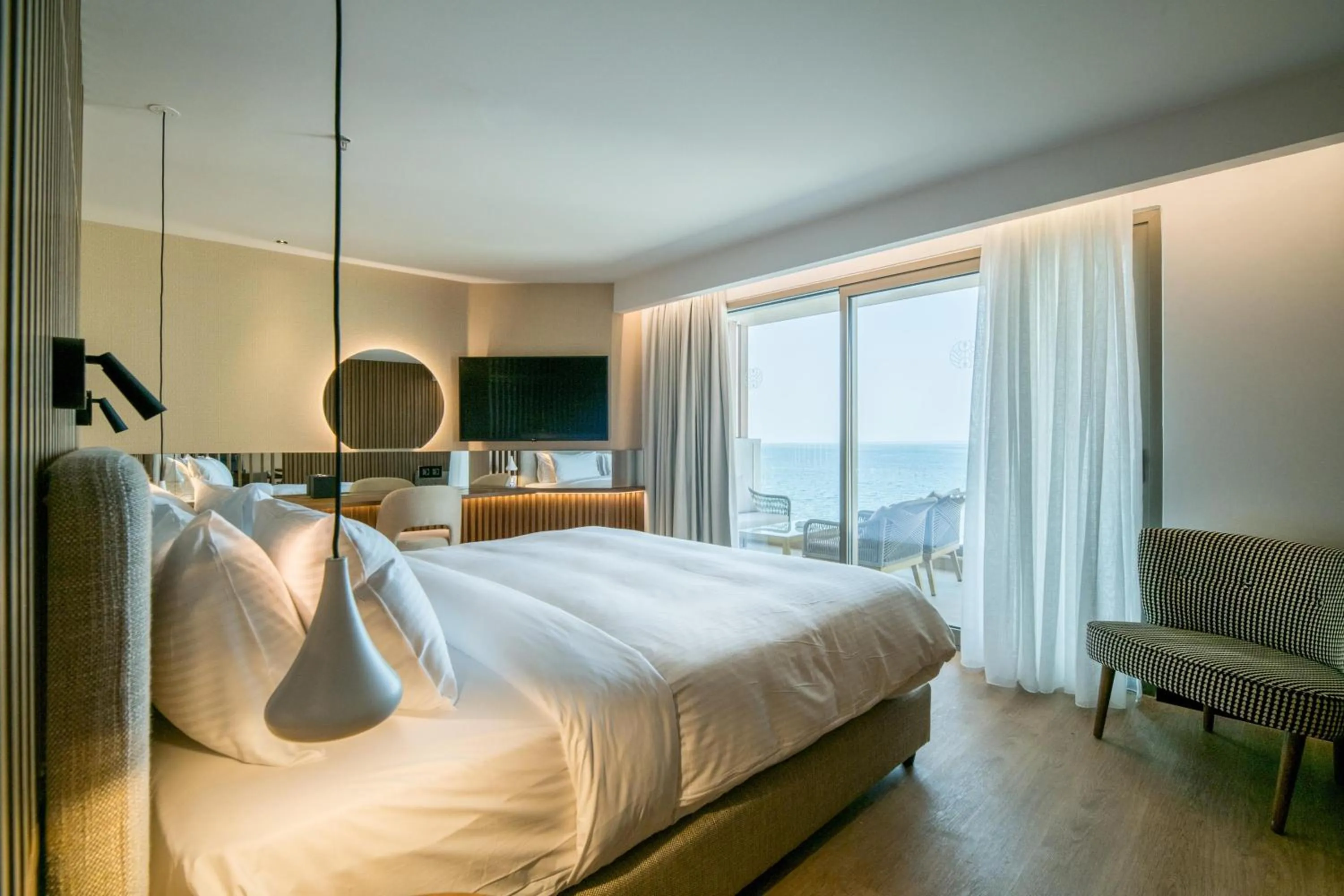 Photo of the whole room, Bed in AKASHA Beach Hotel & Spa