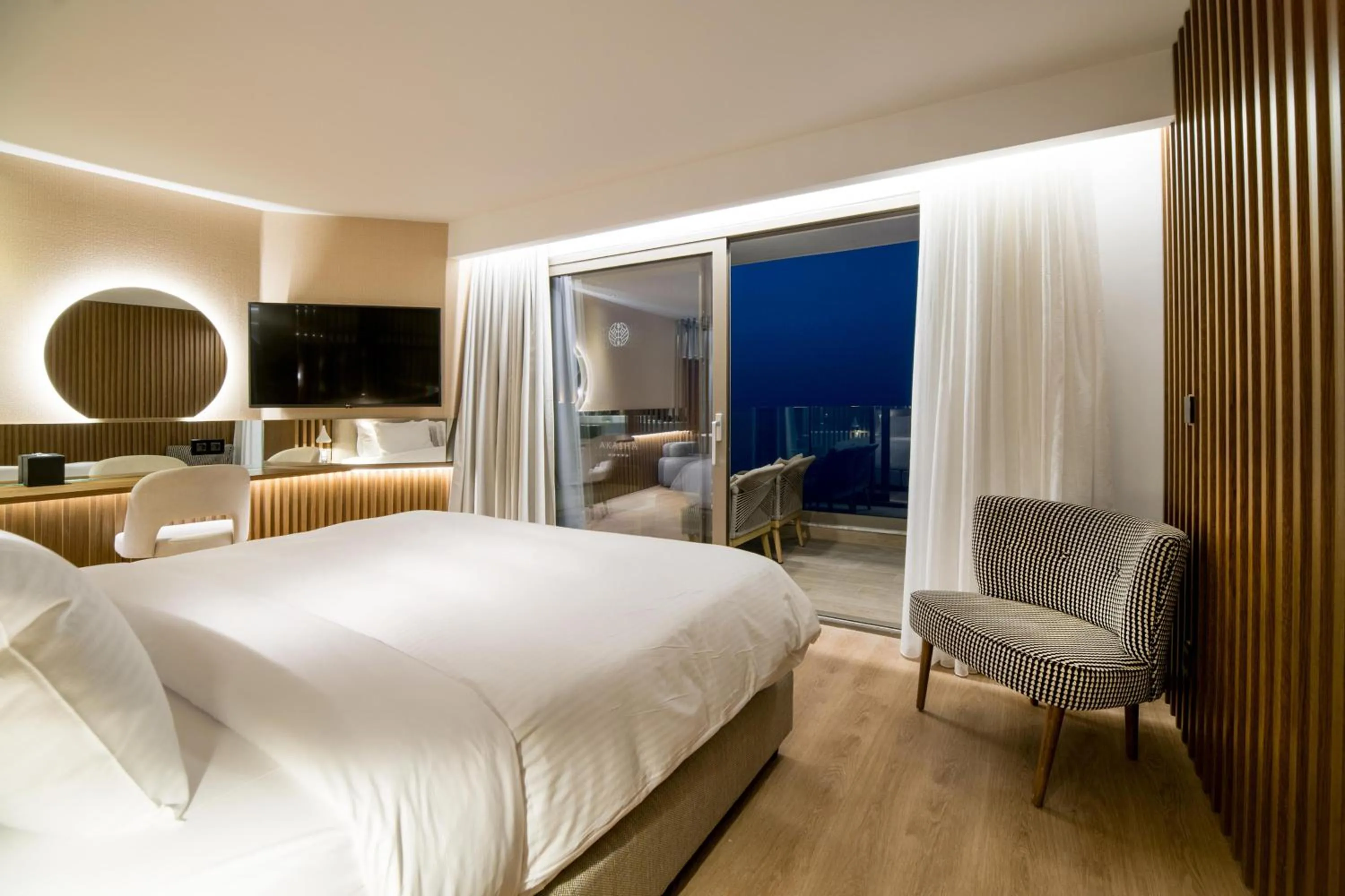 Photo of the whole room, Bed in AKASHA Beach Hotel & Spa