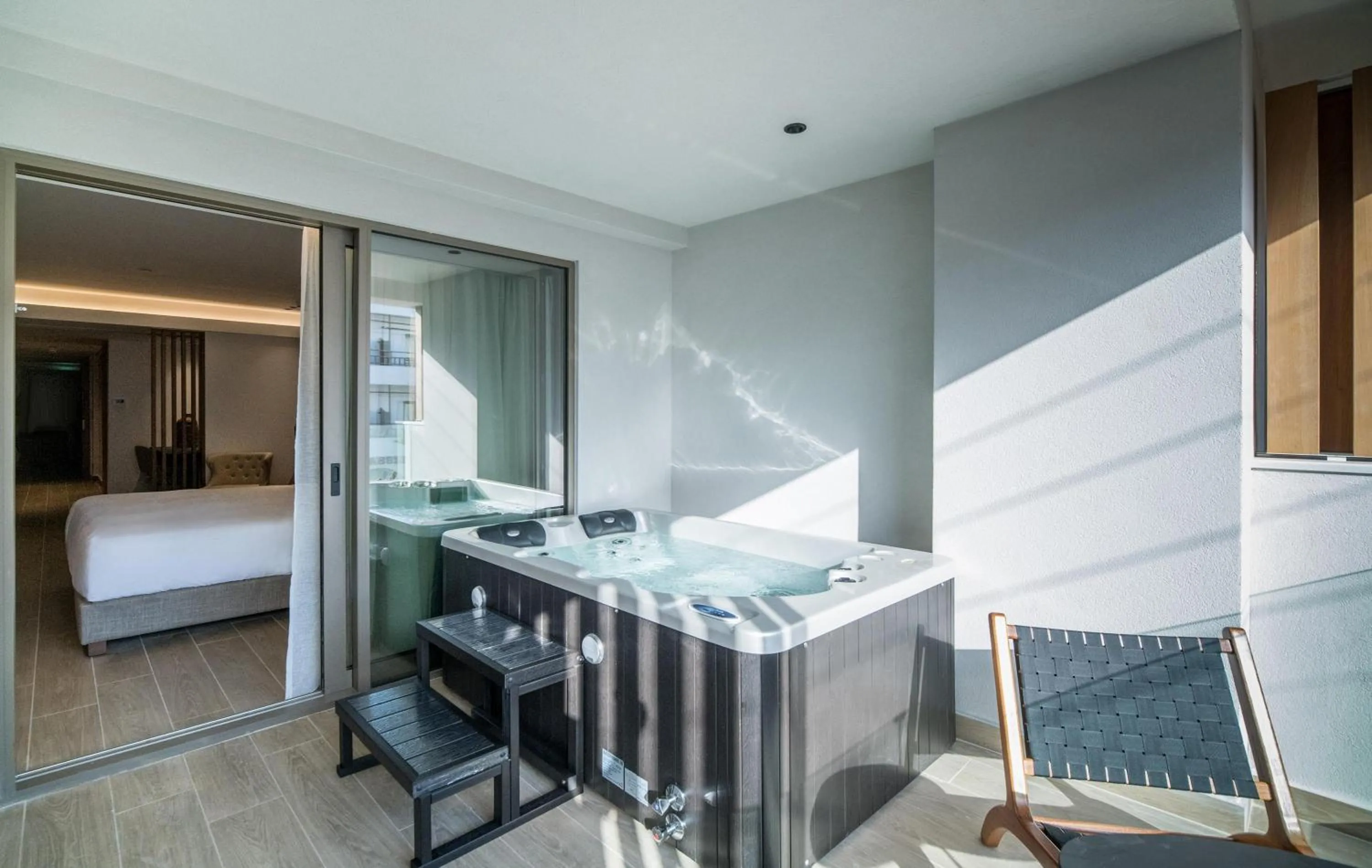 Bathroom, Bed in AKASHA Beach Hotel & Spa