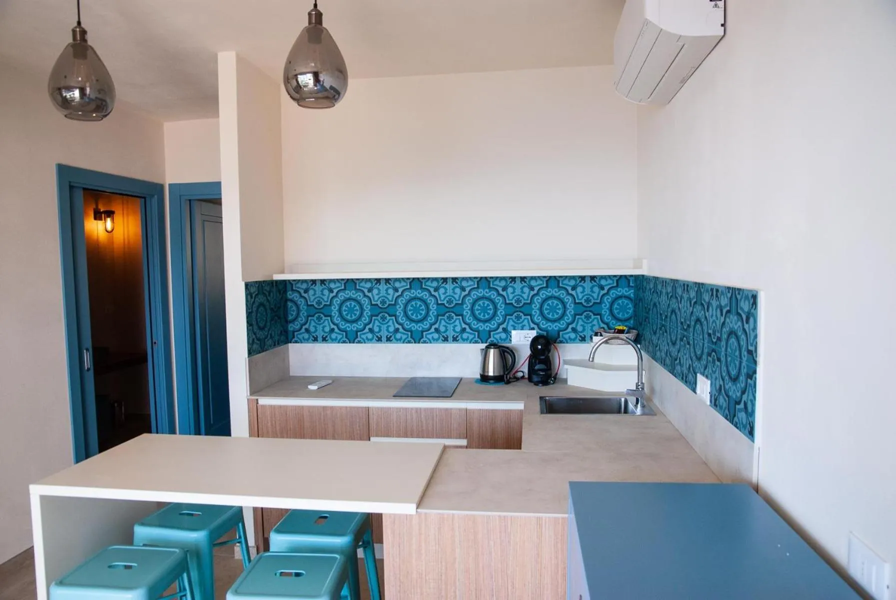Kitchen or kitchenette in Resort Capo Bianco