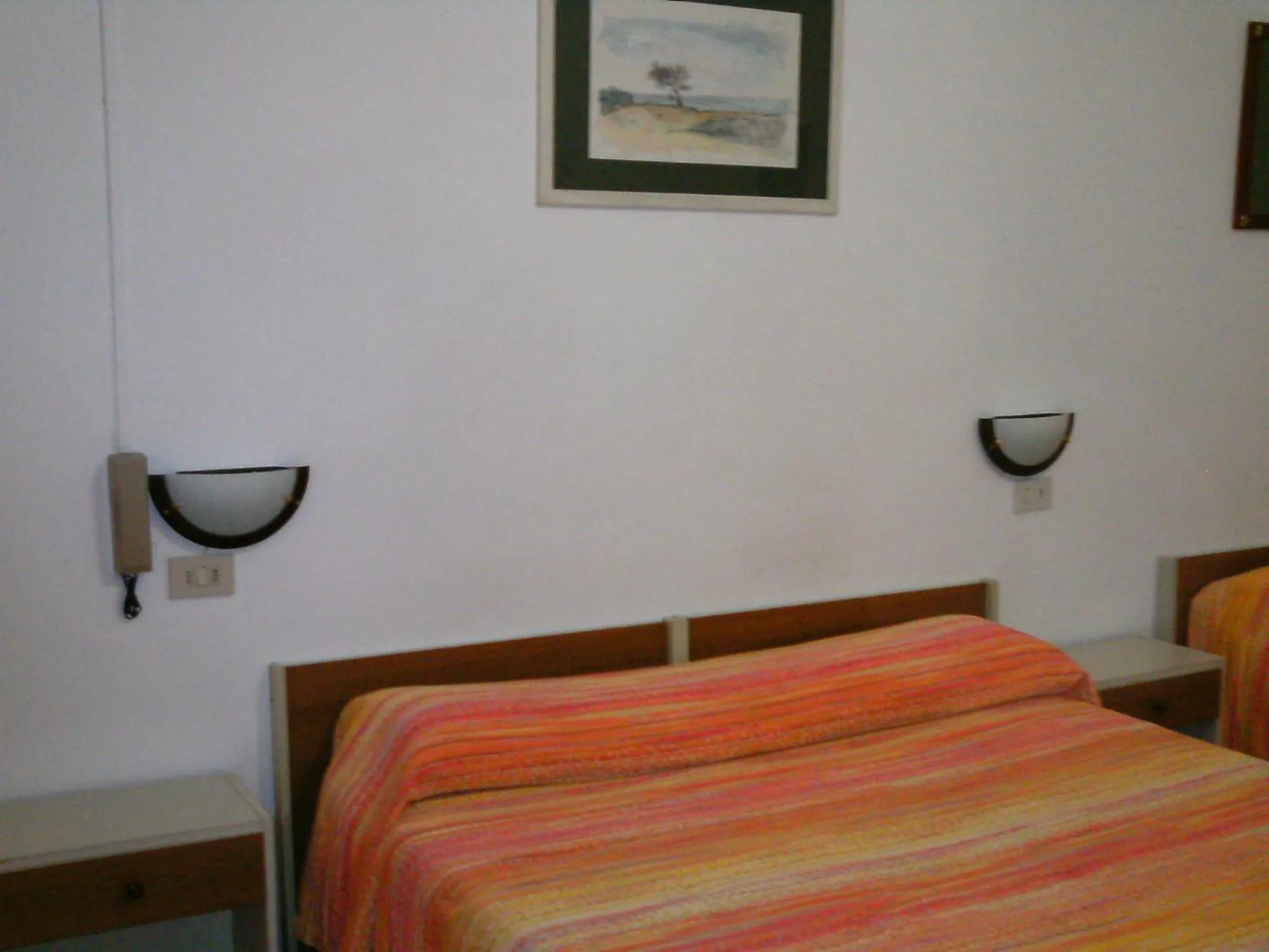 Photo of the whole room in Albergo Cavour SELF CHECK-IN