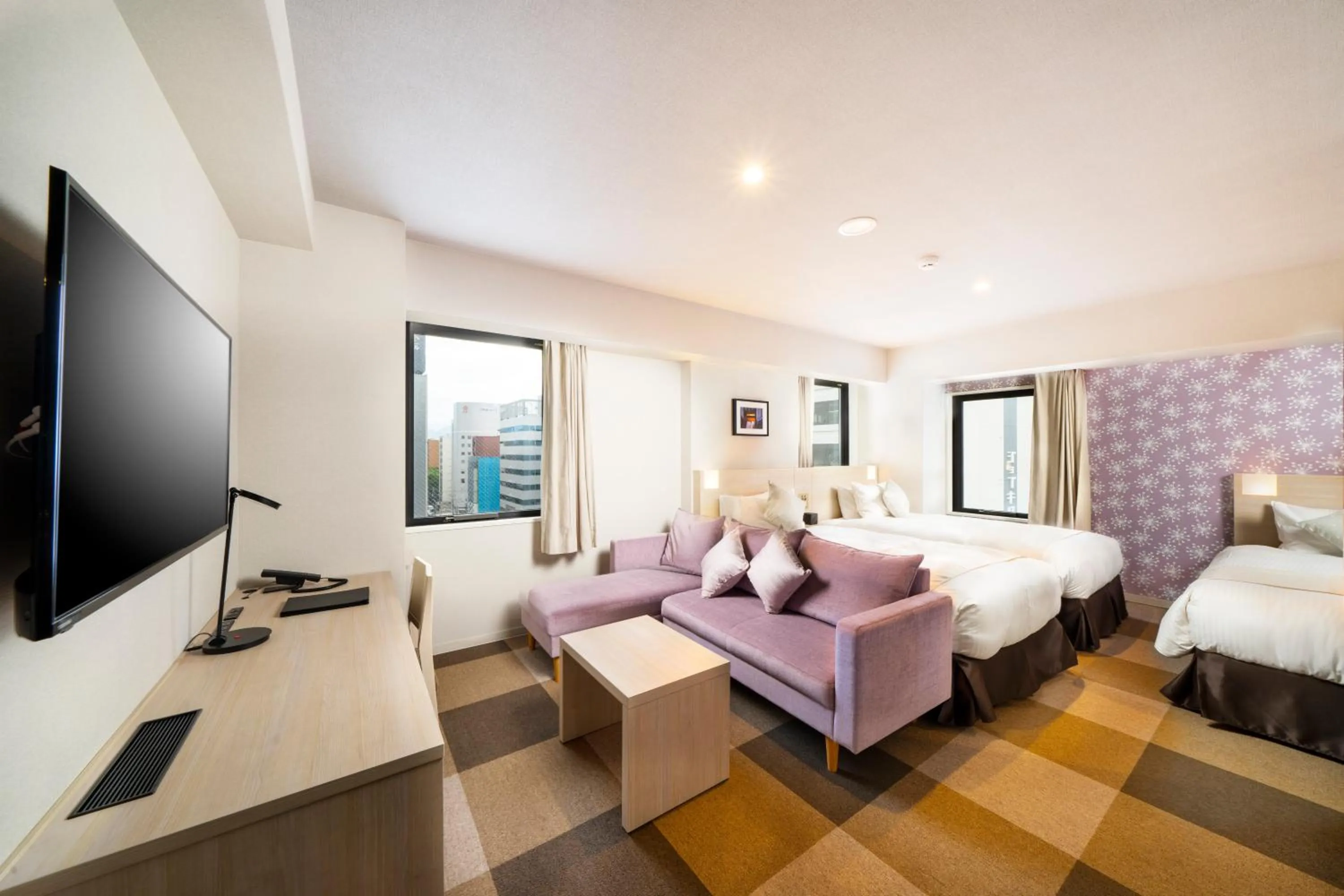 Bed in KOKO HOTEL Sapporo Odori