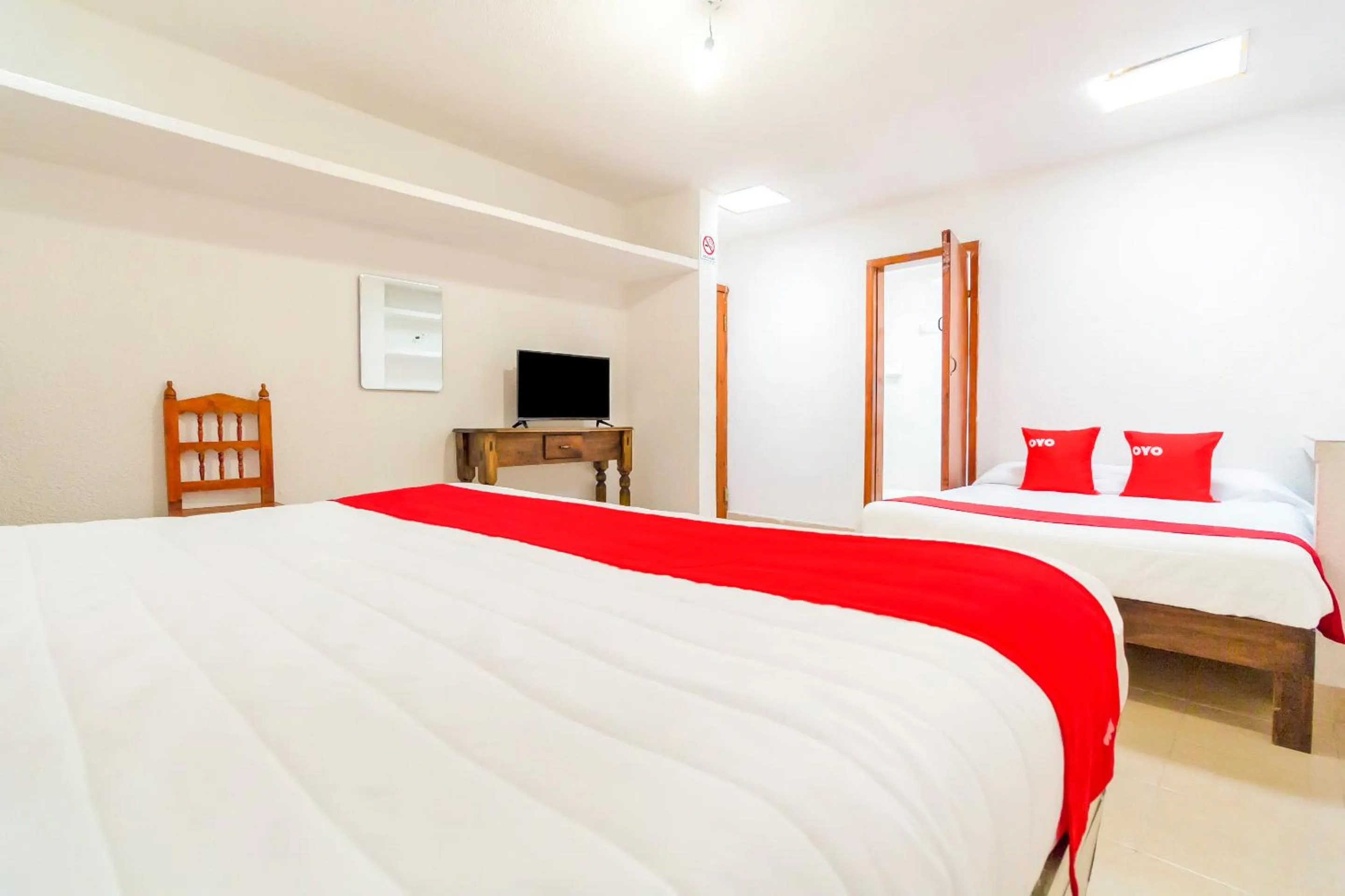 Bedroom, Bed in OYO Hotel Las Nubes,Mercado de Dulces y Artesanias Ambar