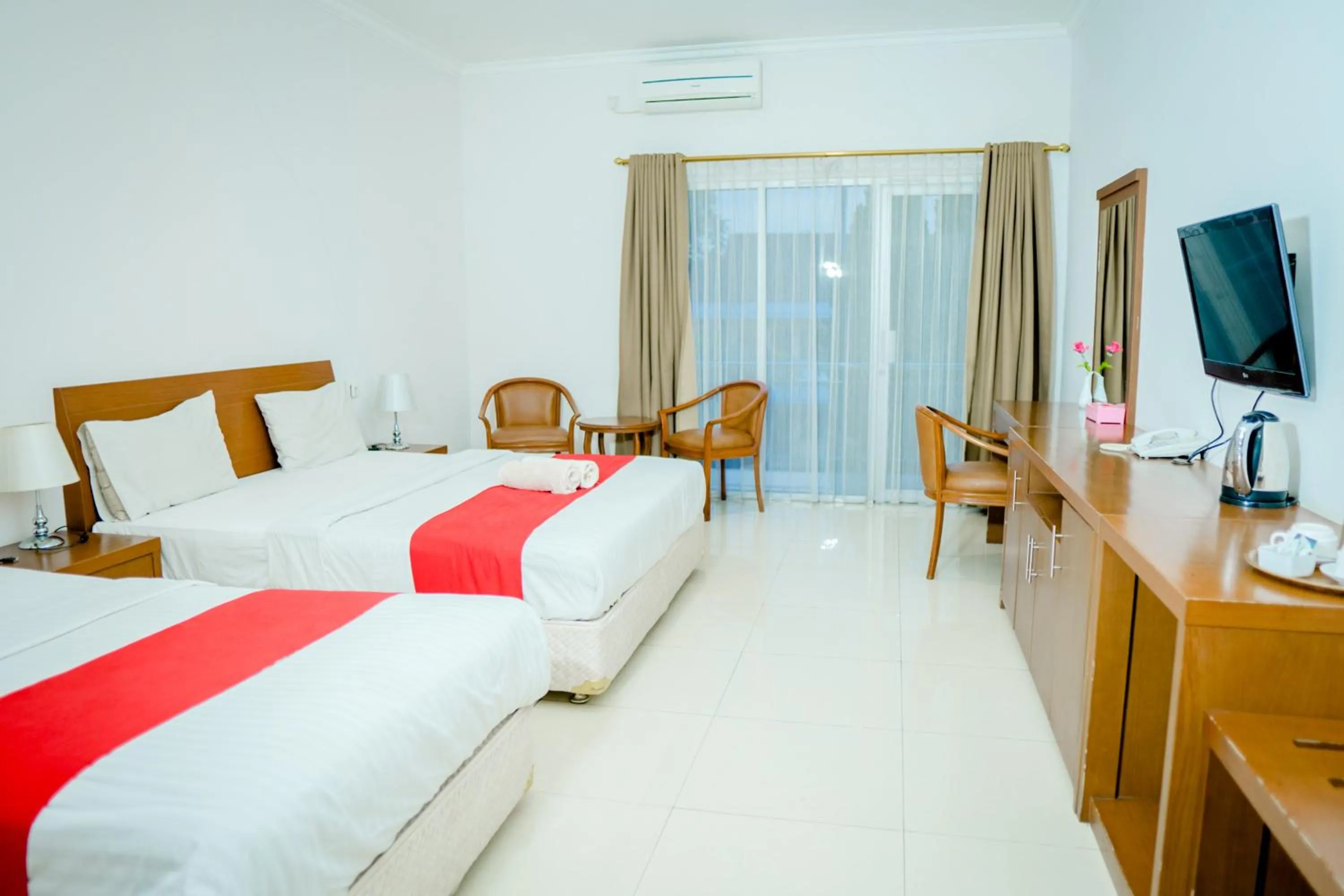 Bed in HOTEL & WISMA BINTANG JADAYAT