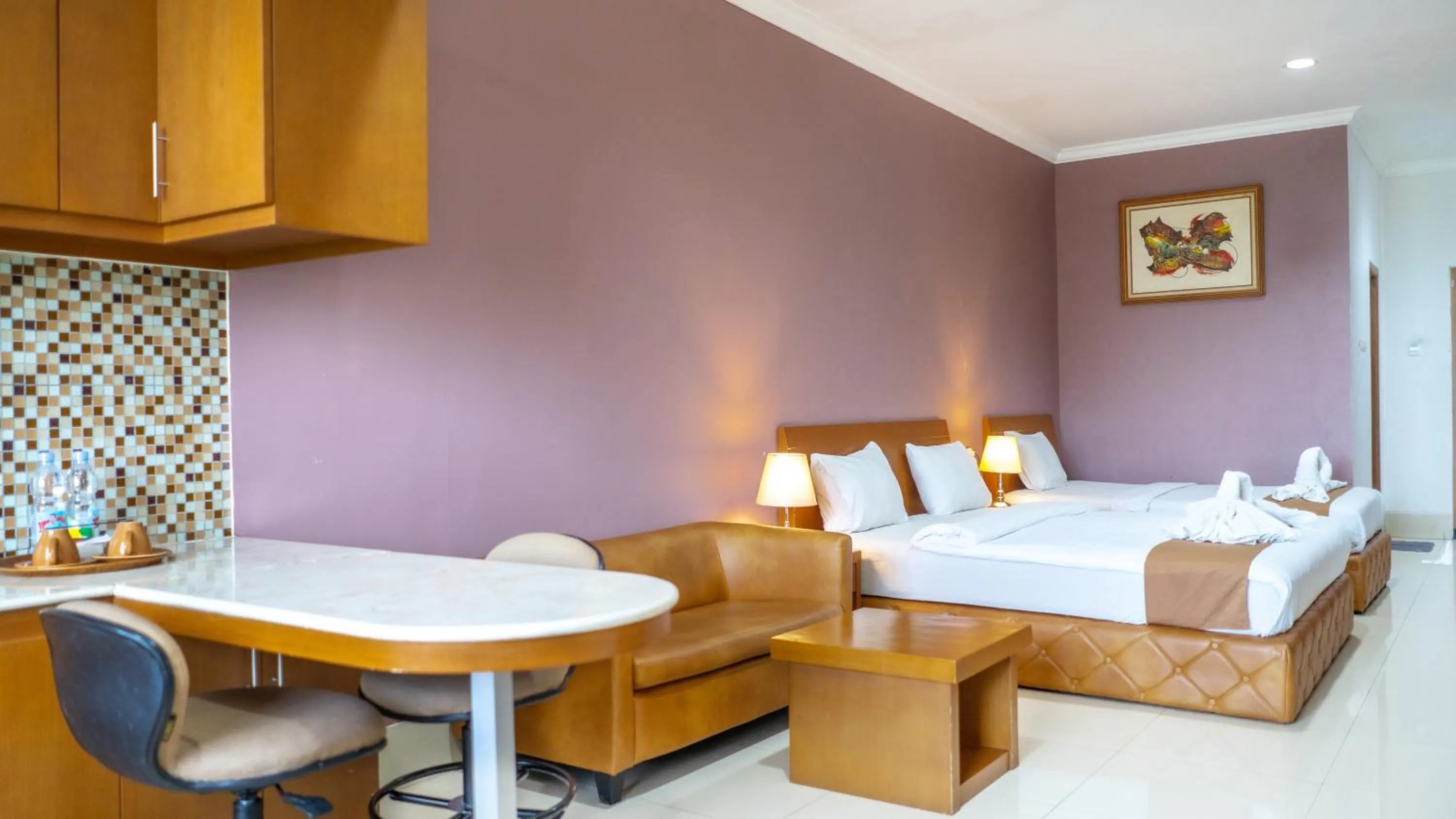 Bed in HOTEL & WISMA BINTANG JADAYAT