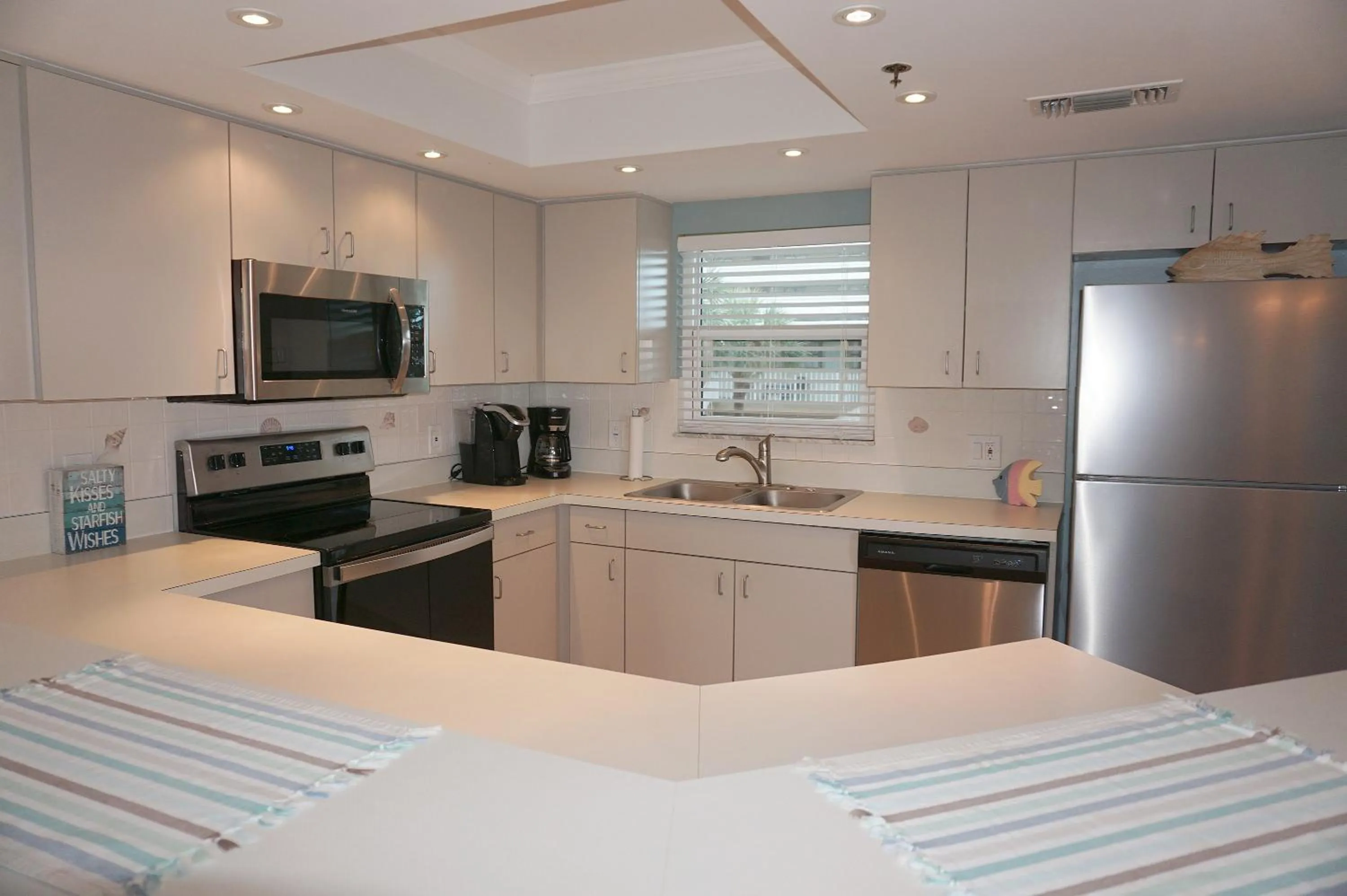 Kitchen or kitchenette in Gulf Strand Resort by Travel Resort Services