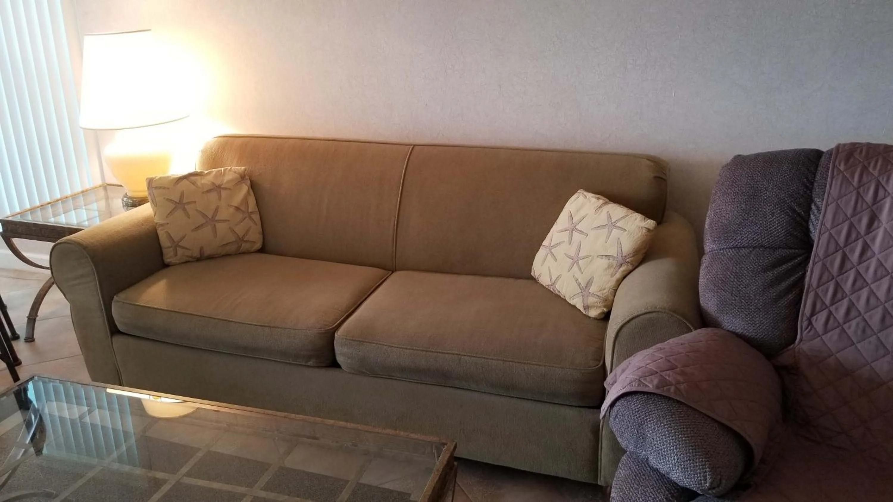 Living room in Gulf Strand Resort by Travel Resort Services