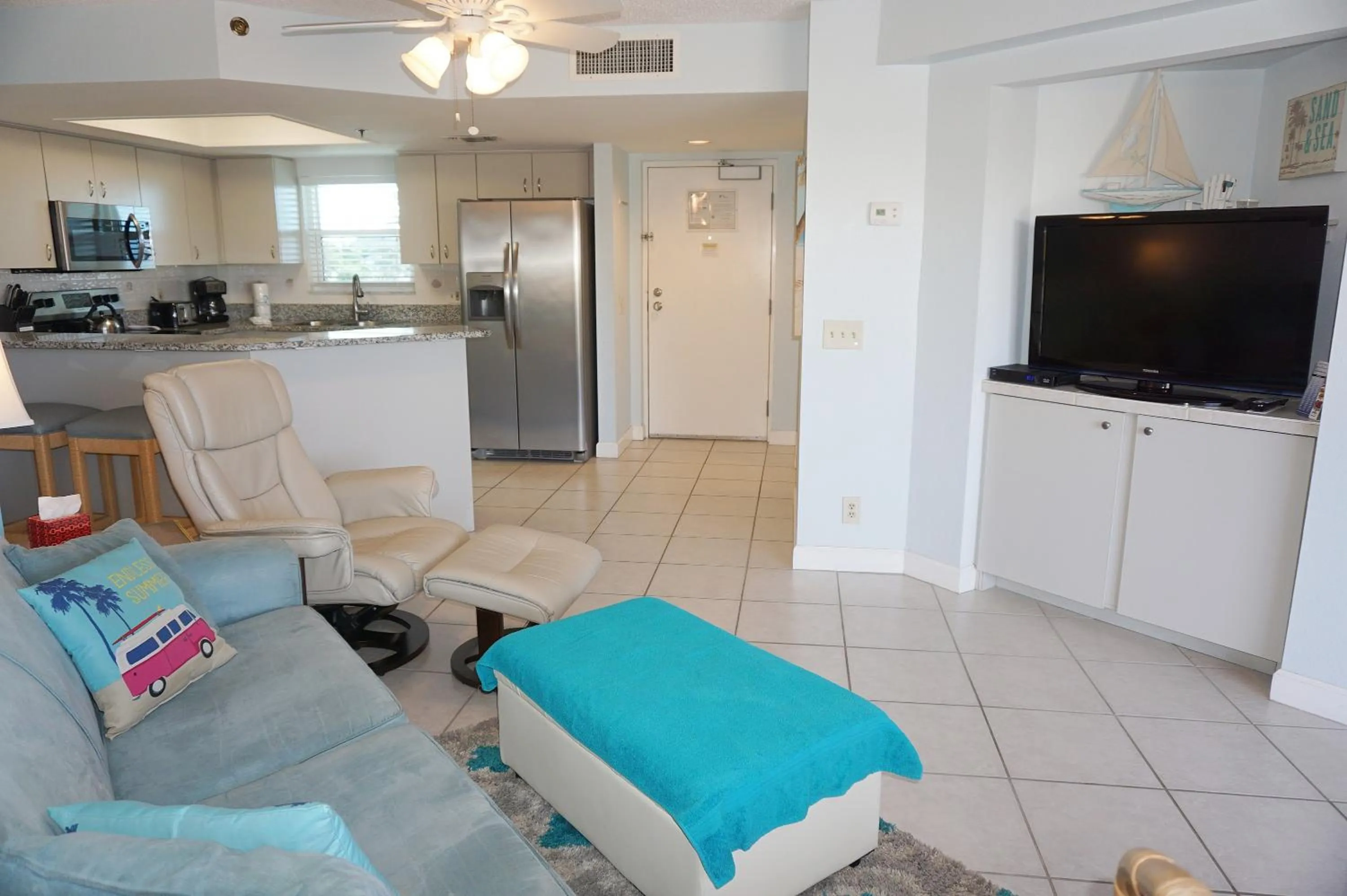 Living room in Gulf Strand Resort by Travel Resort Services