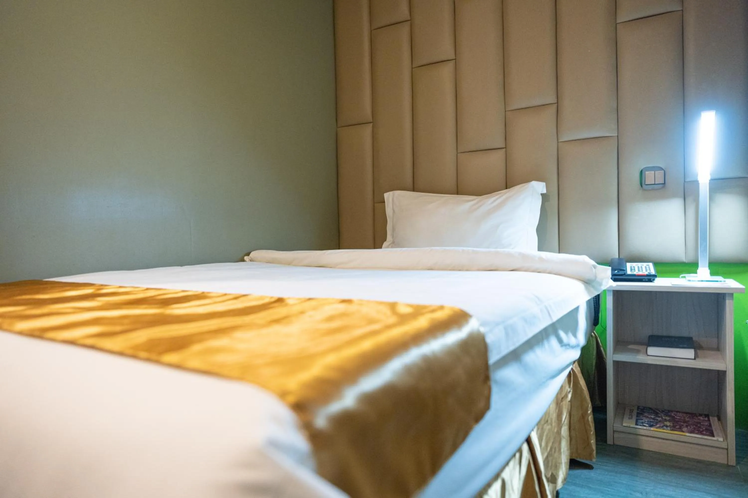 Bed in Felicity Island Hotel