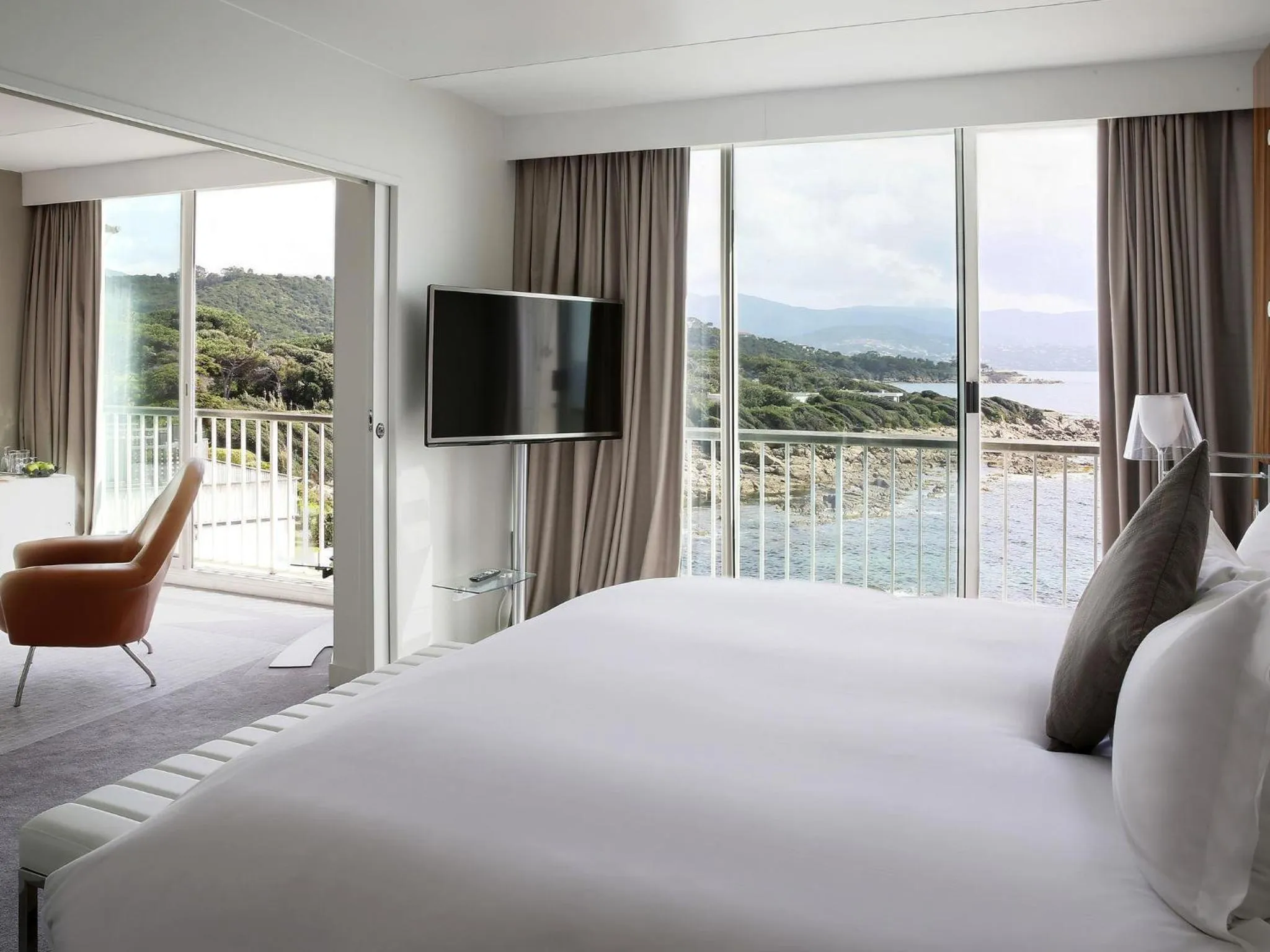 Photo of the whole room, Bed in Sofitel Golfe d'Ajaccio Thalassa Sea & Spa