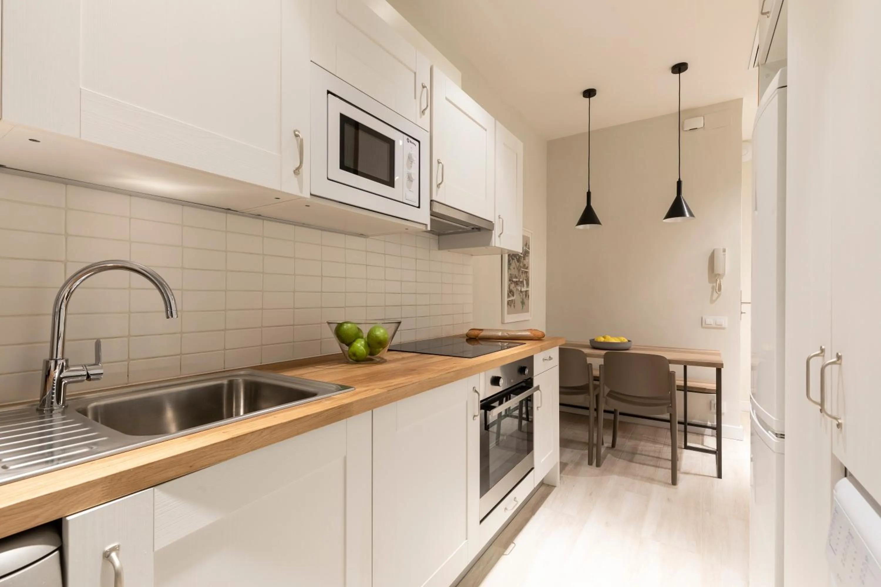 Kitchen or kitchenette in Aspasios Gracia Apartments