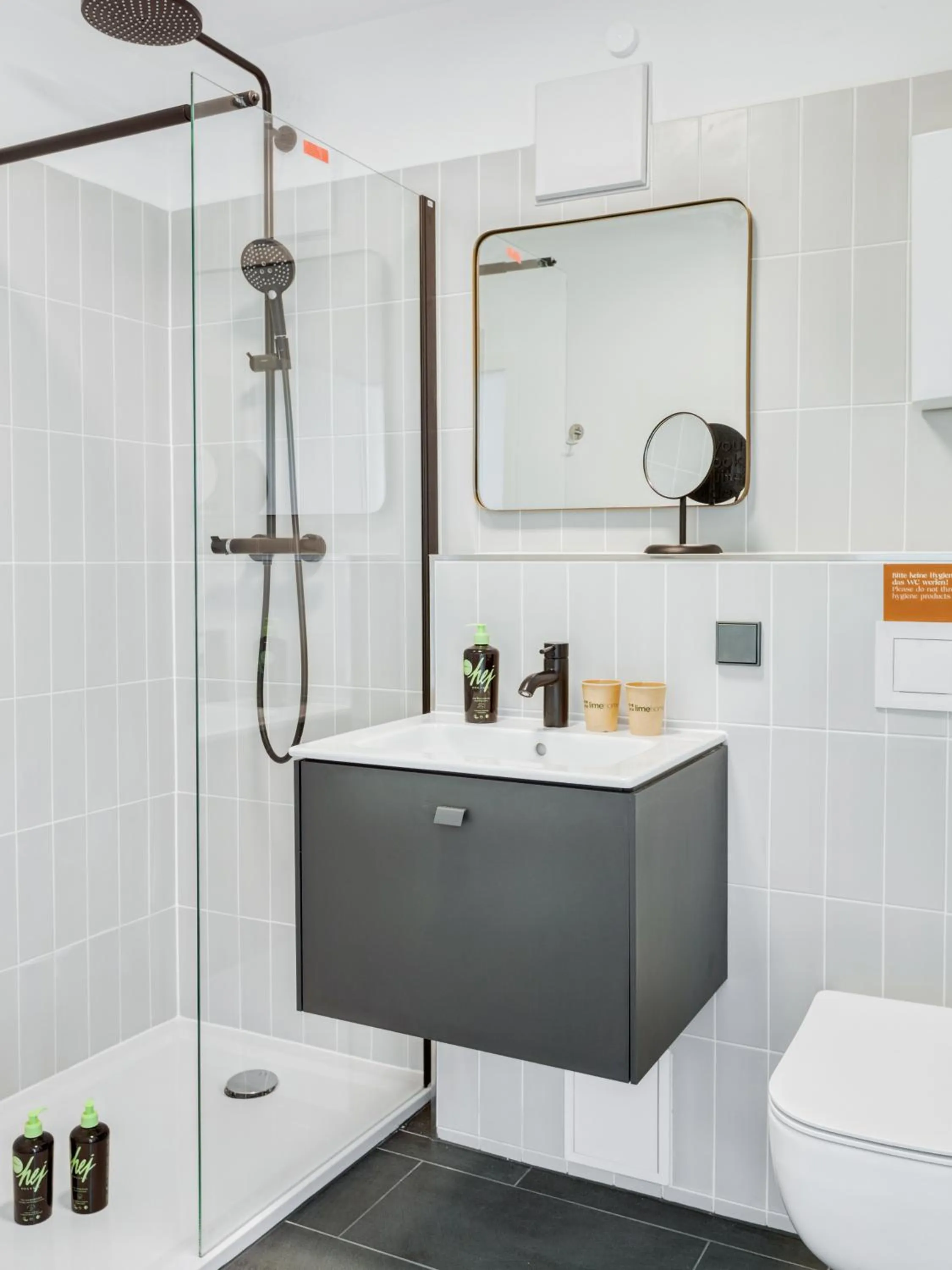 Shower in Limehome Wolfsburg Porschestraße