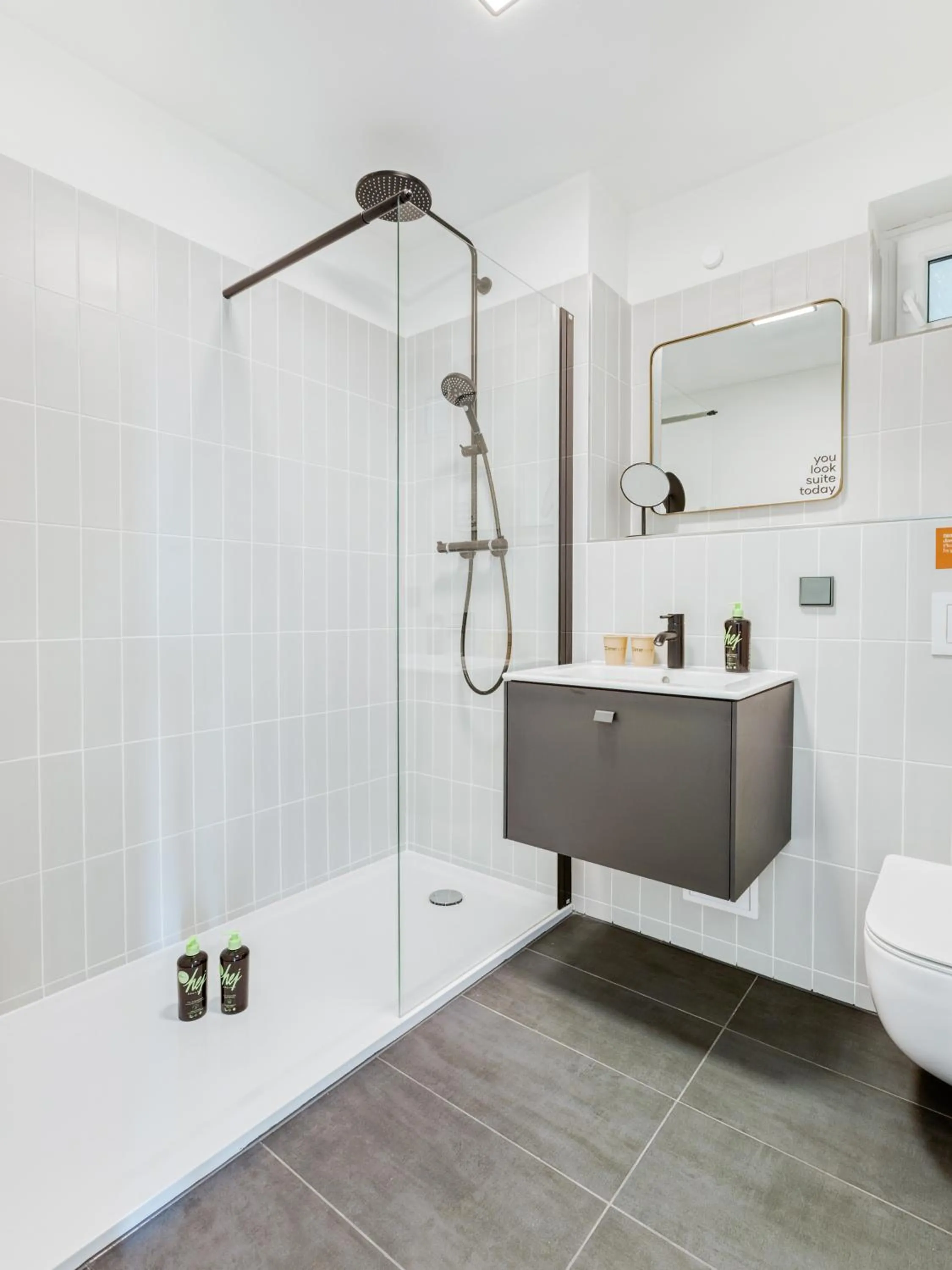 Shower in Limehome Wolfsburg Porschestraße