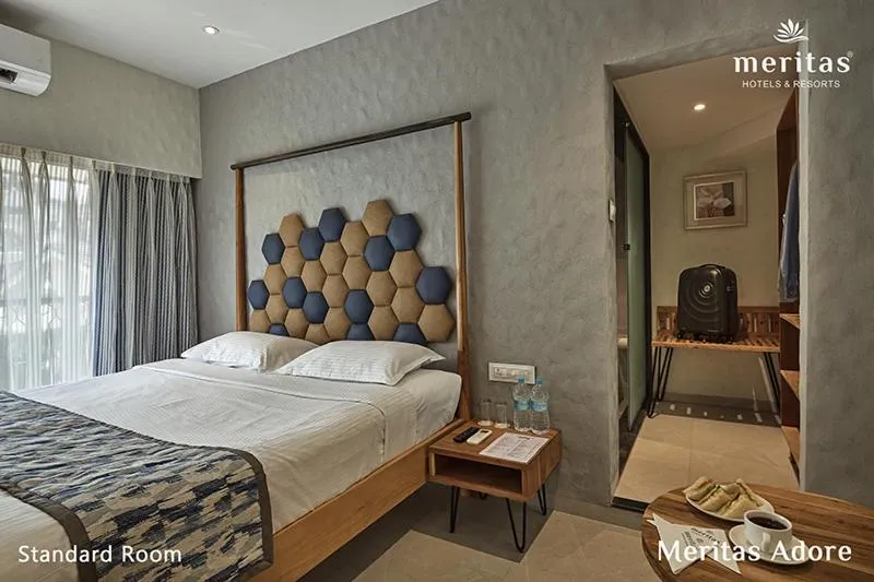 Bed in Meritas Adore Resort