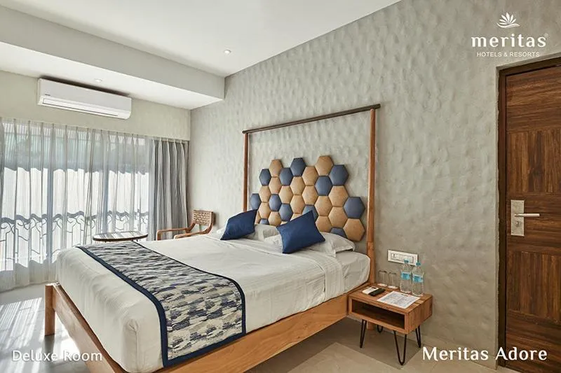 Bed in Meritas Adore Resort