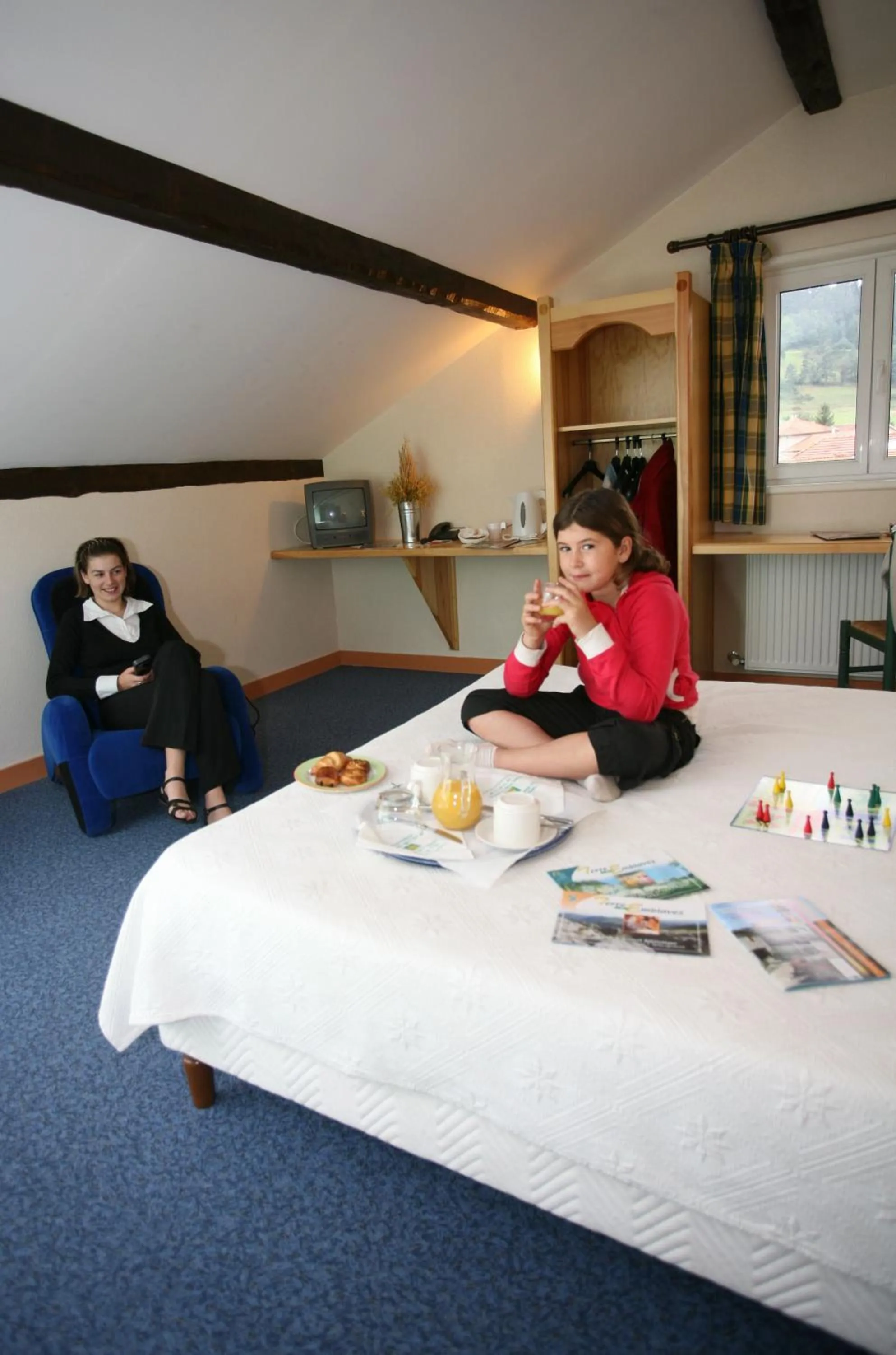 Photo of the whole room in Logis Hotel Restaurant Auberge Les Rives de l'Arzon