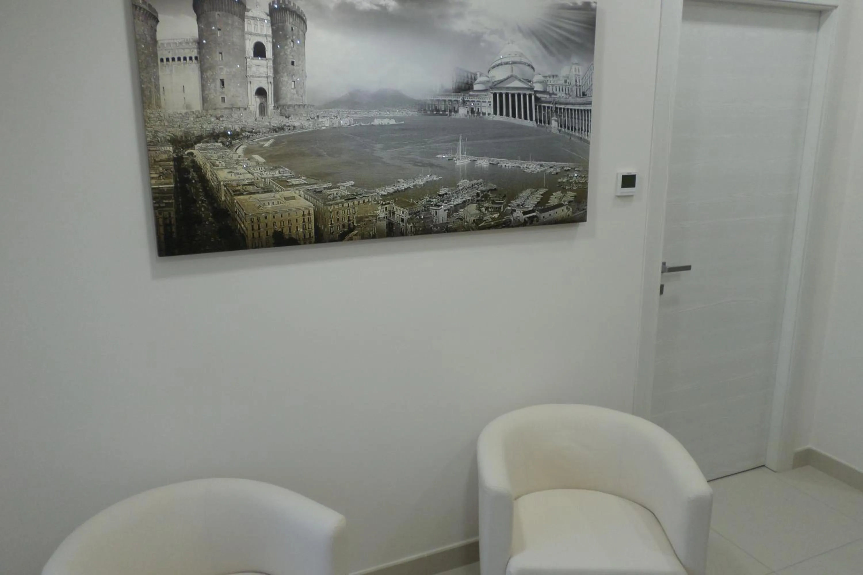 Communal lounge/ TV room in B&B Mansarda del Sole