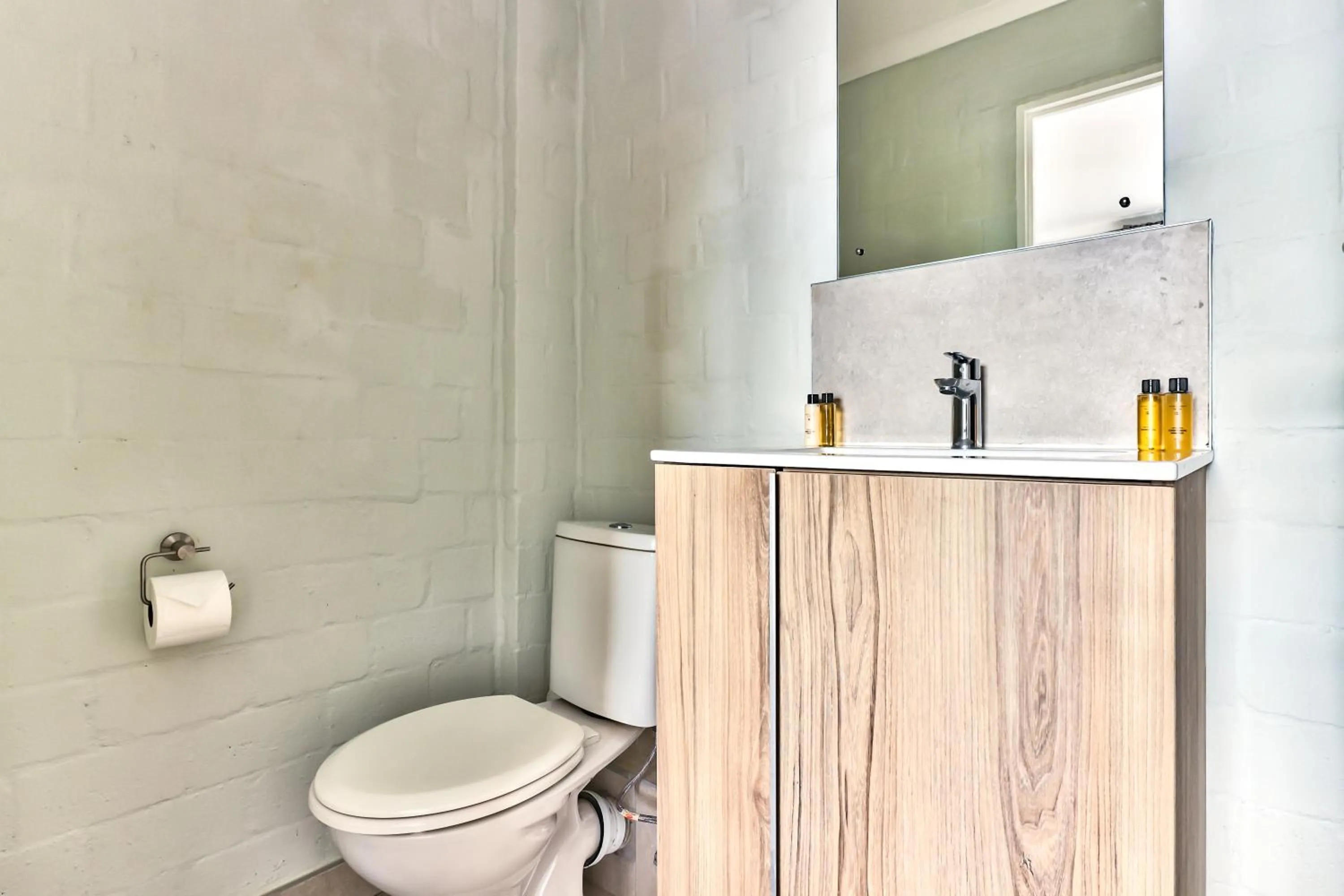 Toilet in WINK Aparthotel Eaton Square