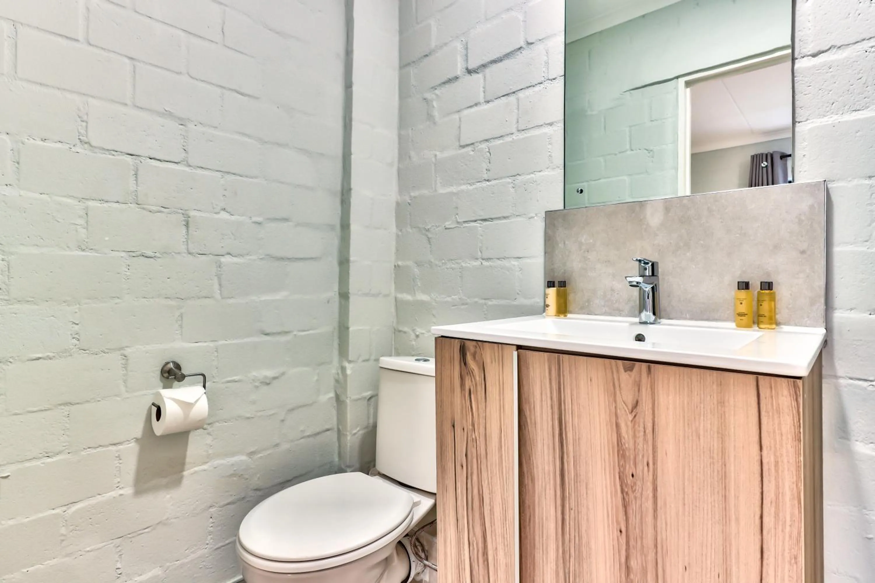 Toilet in WINK Aparthotel Eaton Square