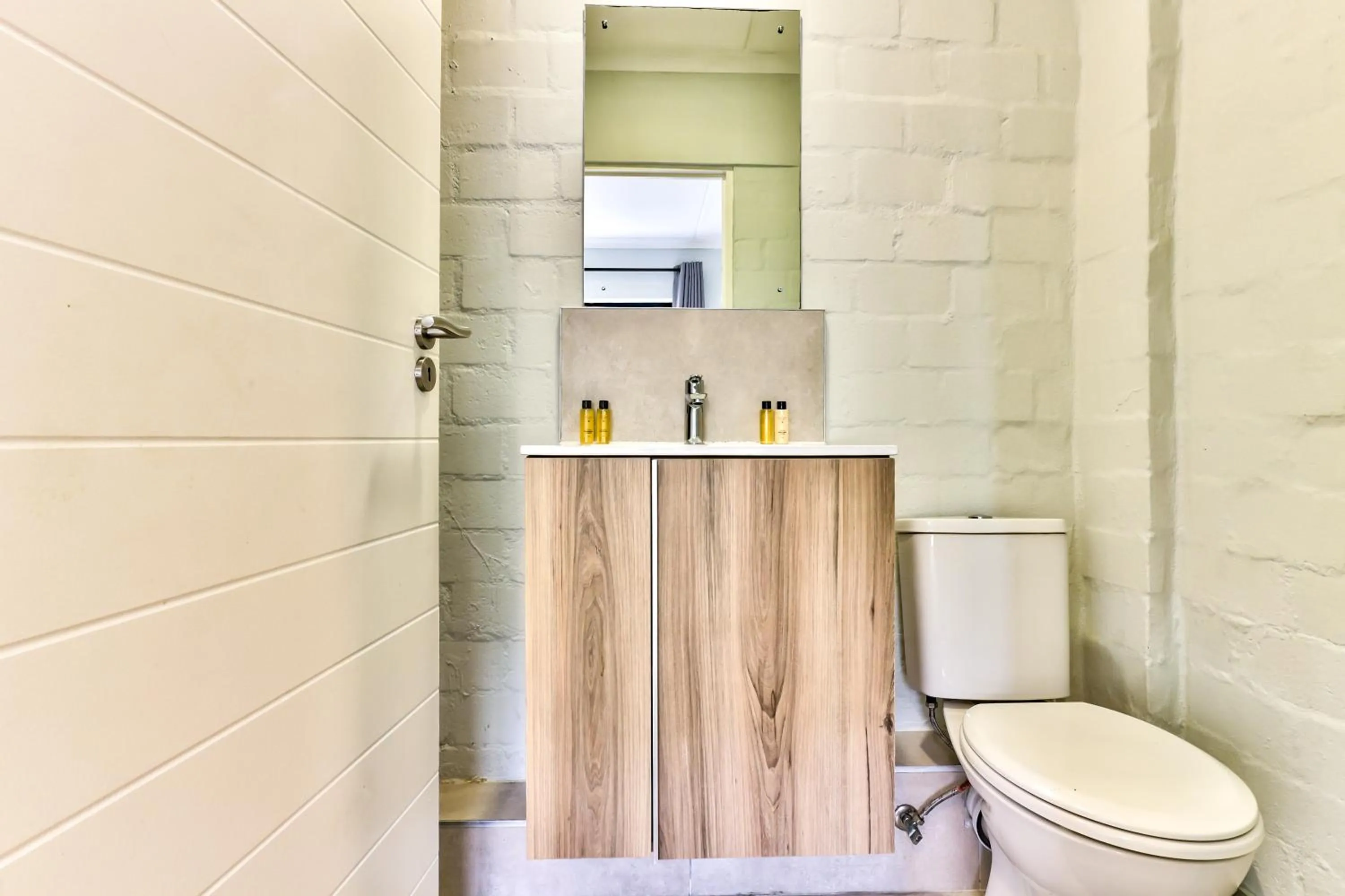 Toilet in WINK Aparthotel Eaton Square