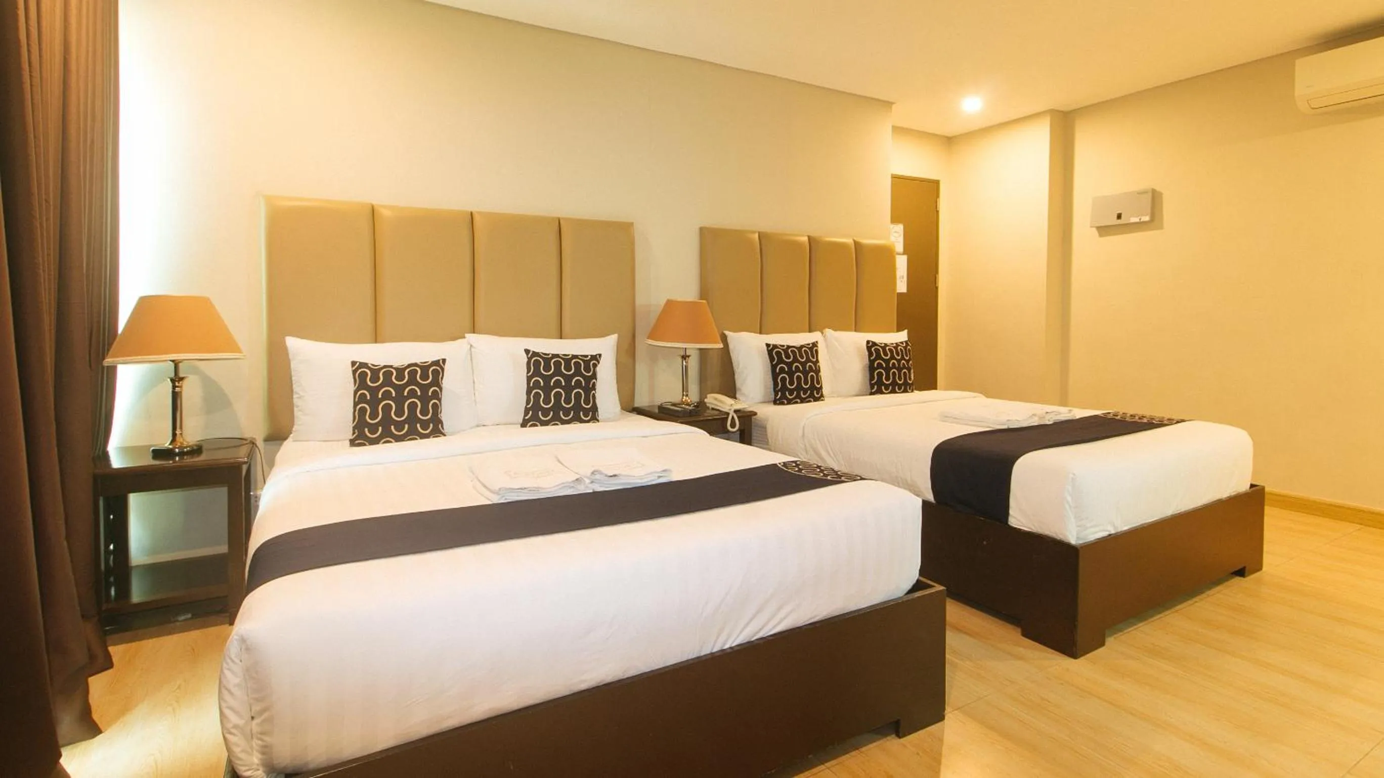 Bed in Asrodel Hotel RedPartner