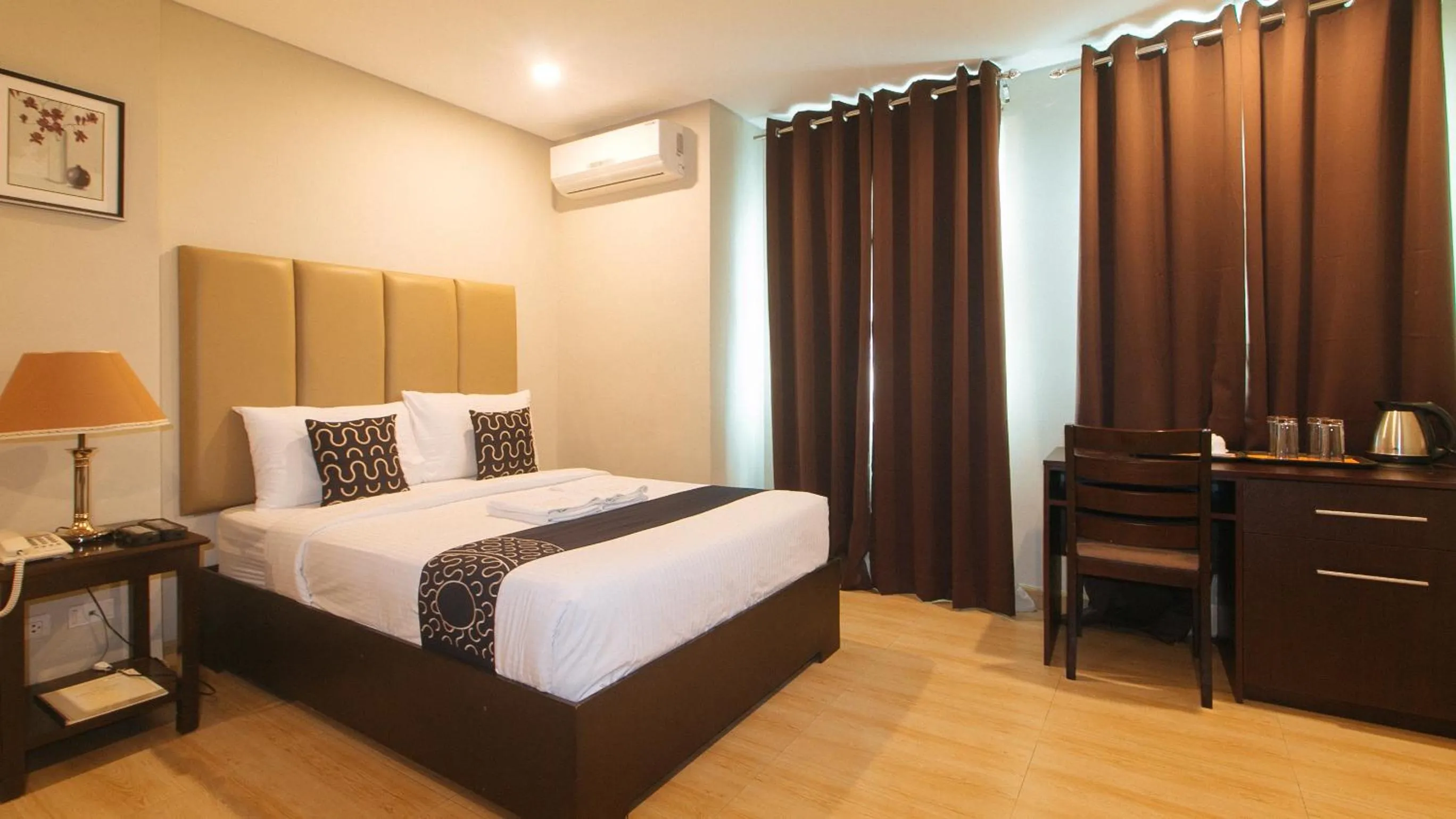 Bed in Asrodel Hotel RedPartner