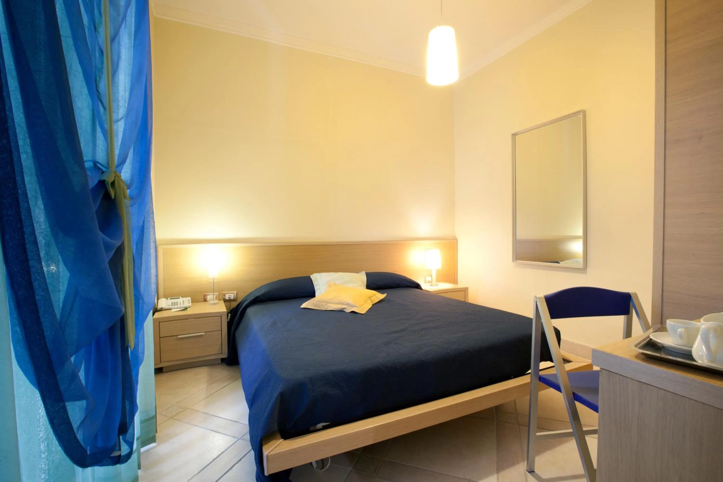 Bed in Posidonia Residence