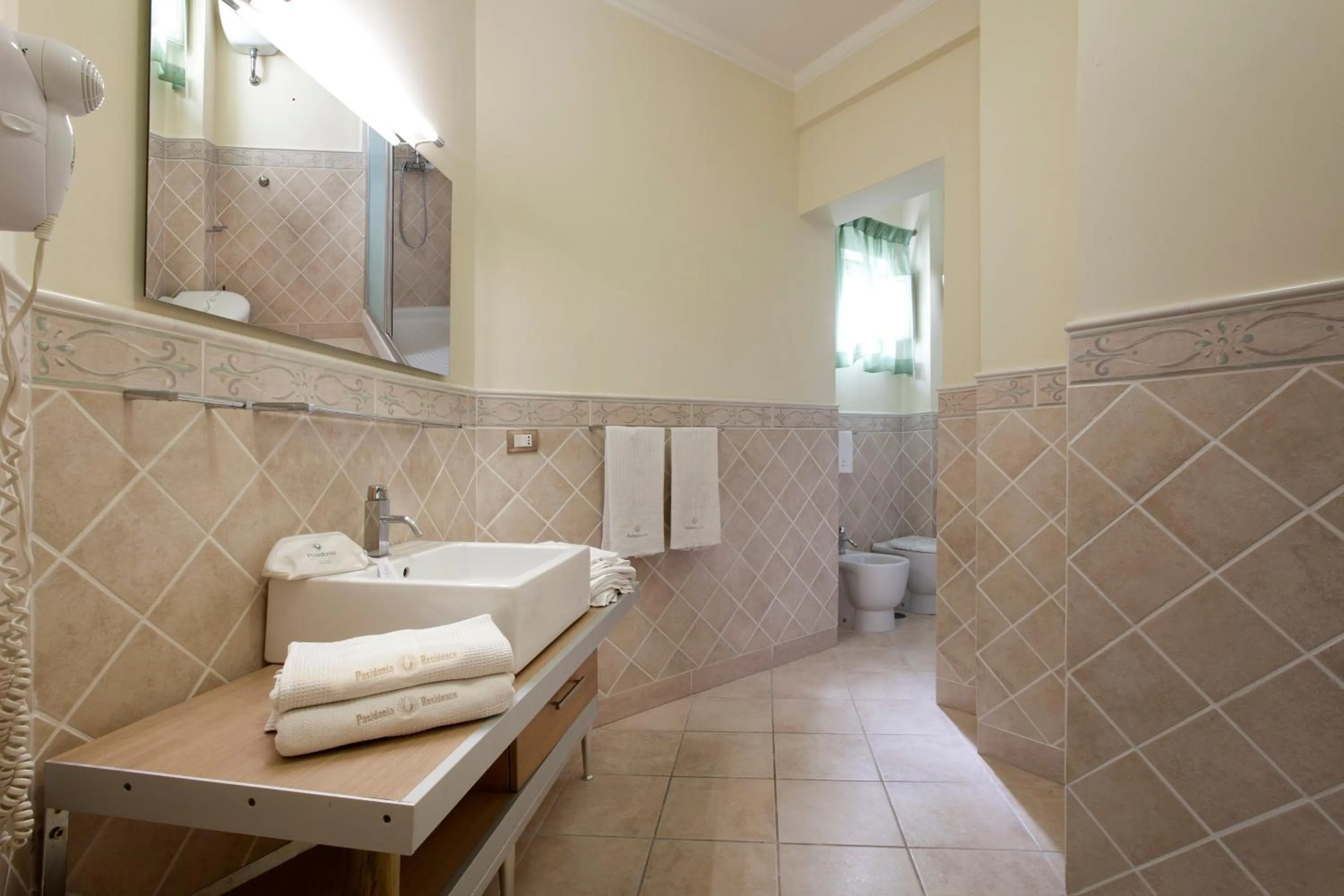 Bathroom in Posidonia Residence