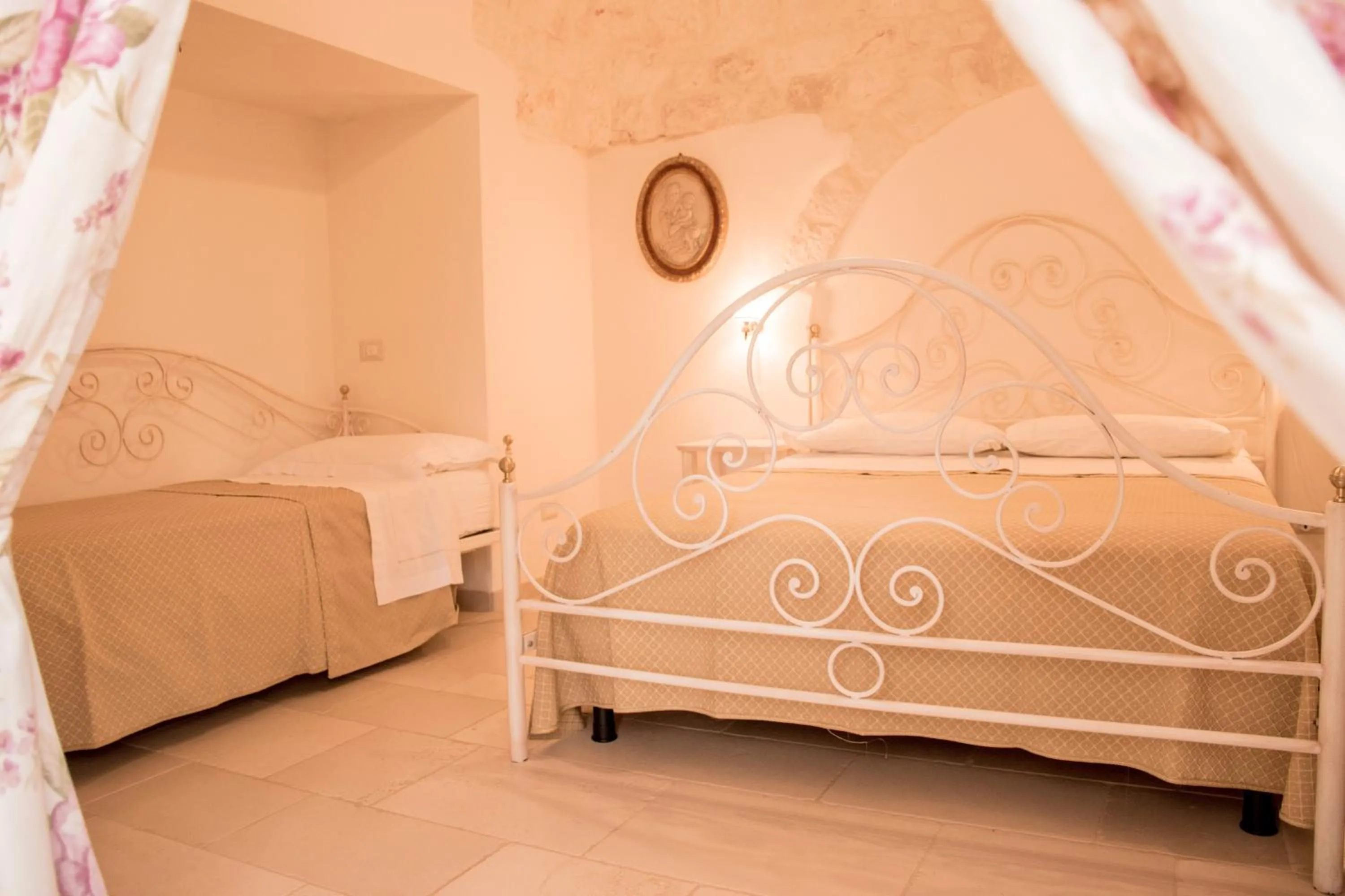 Bed in Micele Holiday Houses