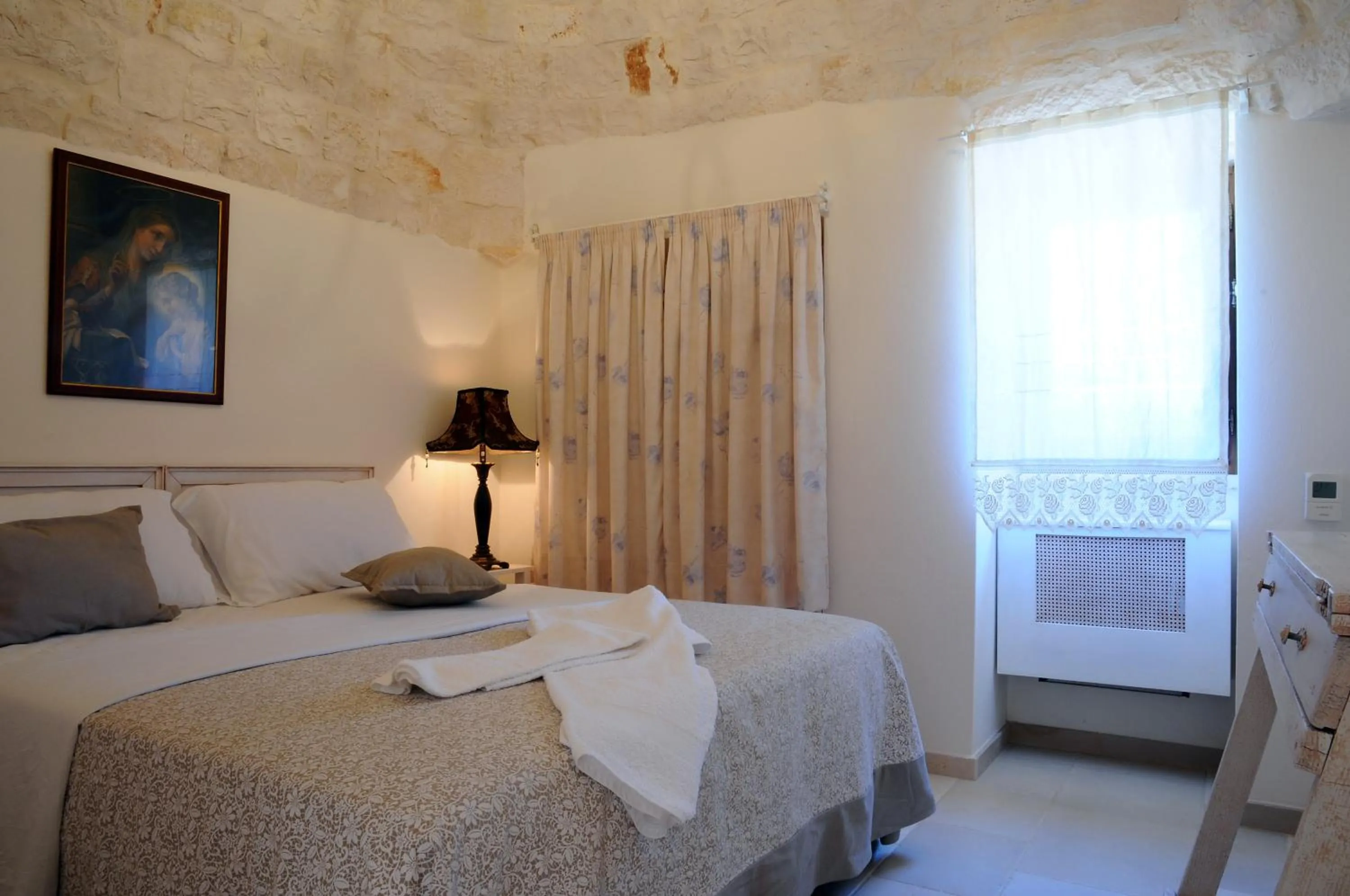 Bed in Micele Holiday Houses