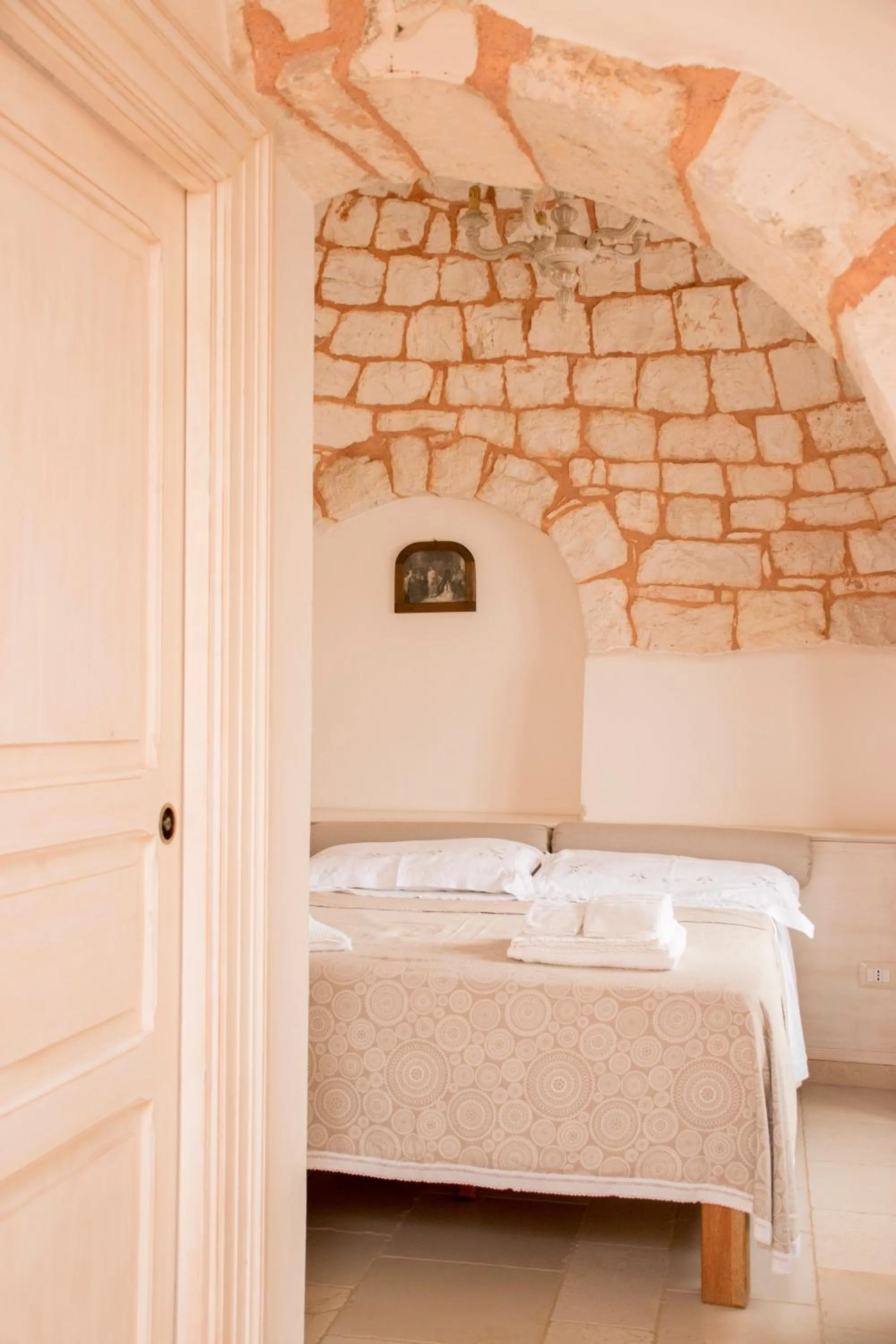 Bed in Micele Holiday Houses