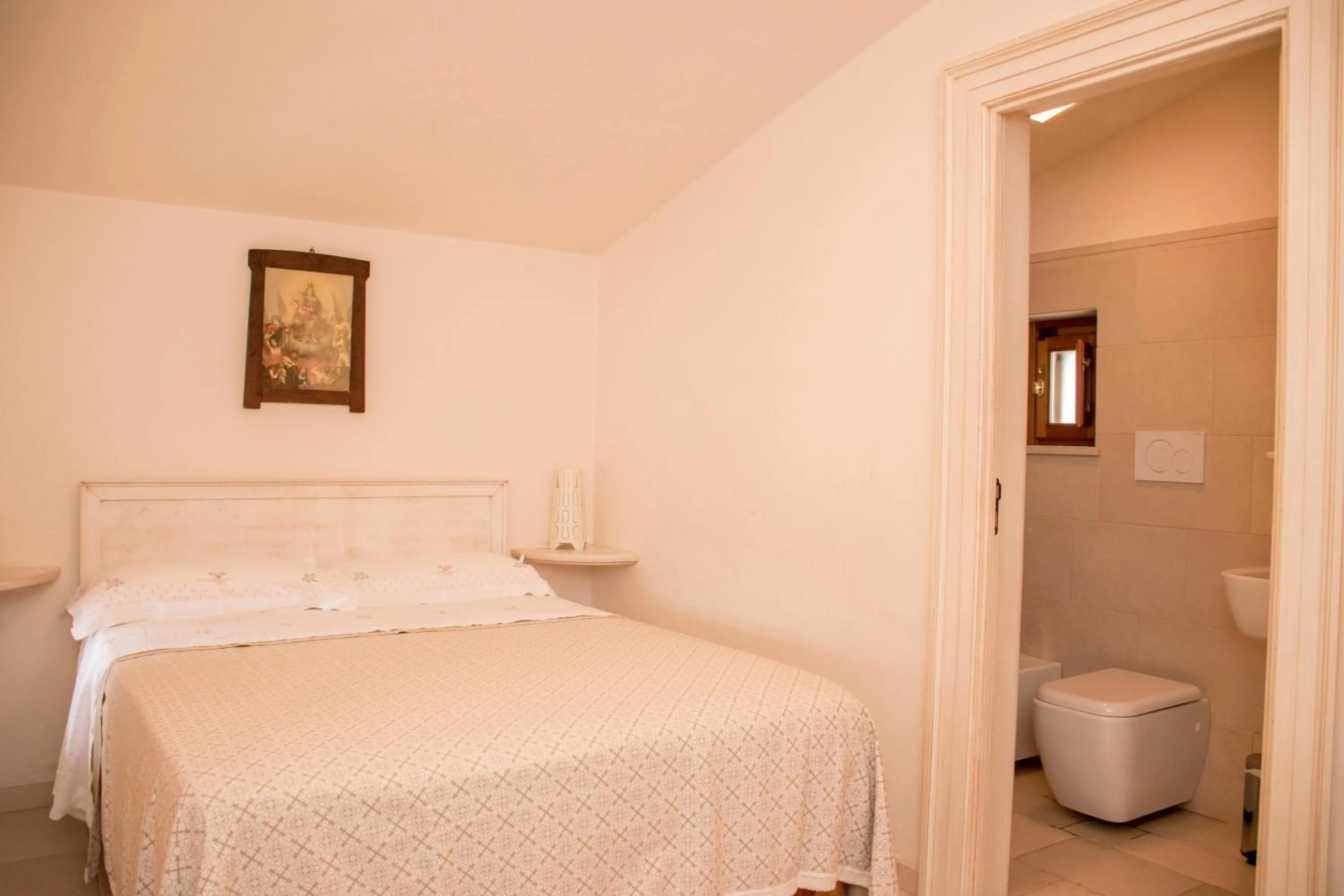 Bed in Micele Holiday Houses