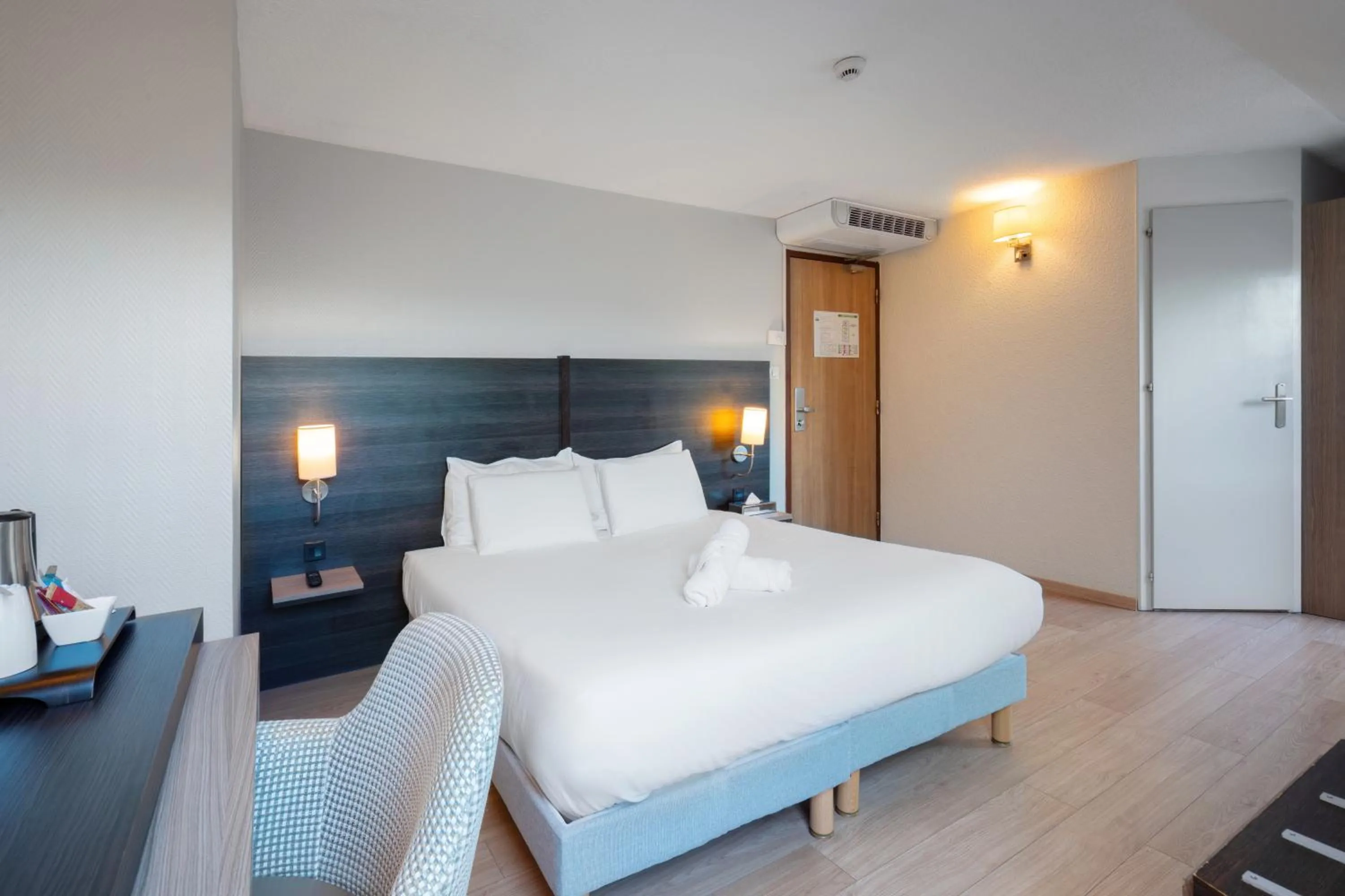 Photo of the whole room, Bed in Kyriad Belfort Centre Gare