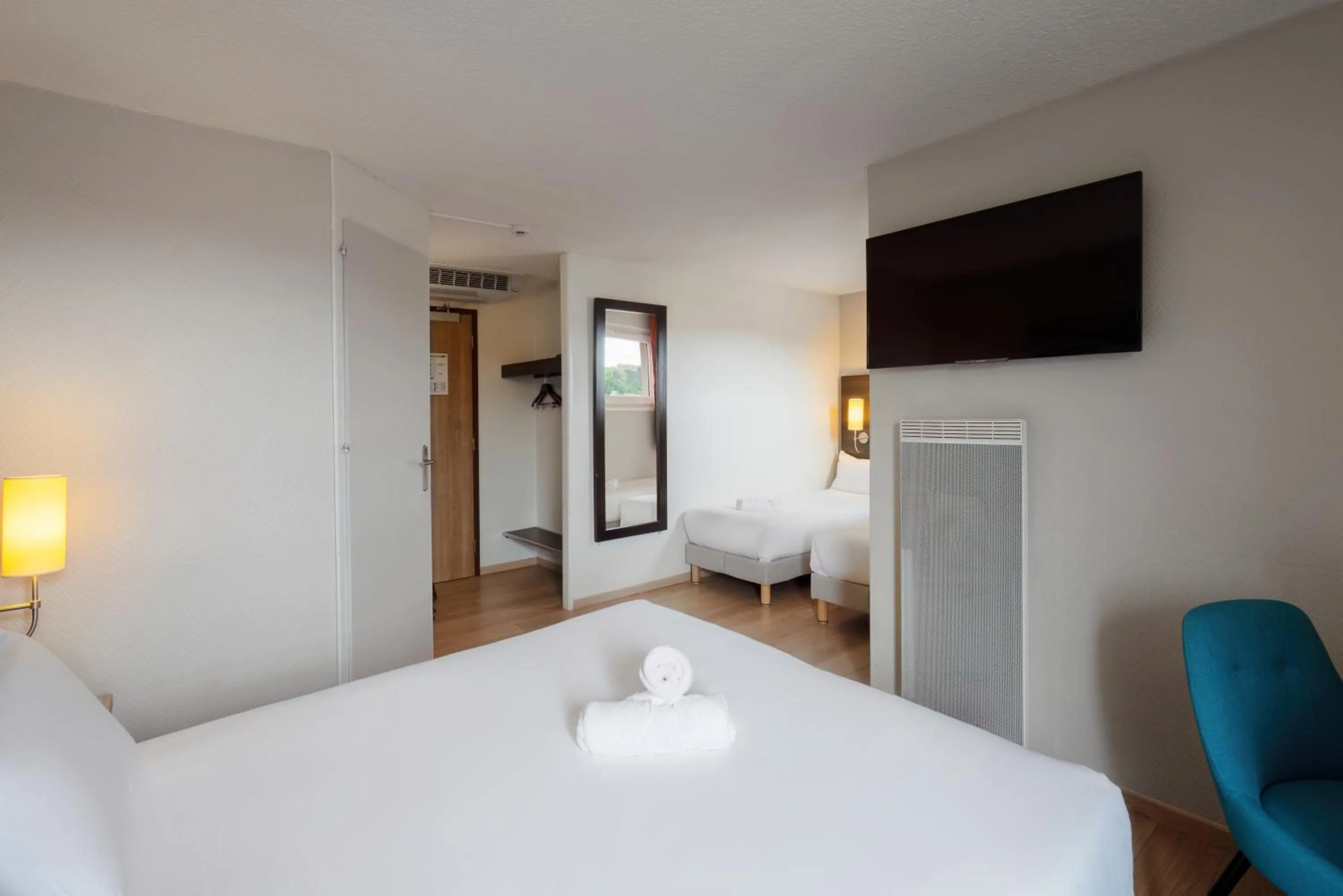 Photo of the whole room, Bed in Kyriad Belfort Centre Gare