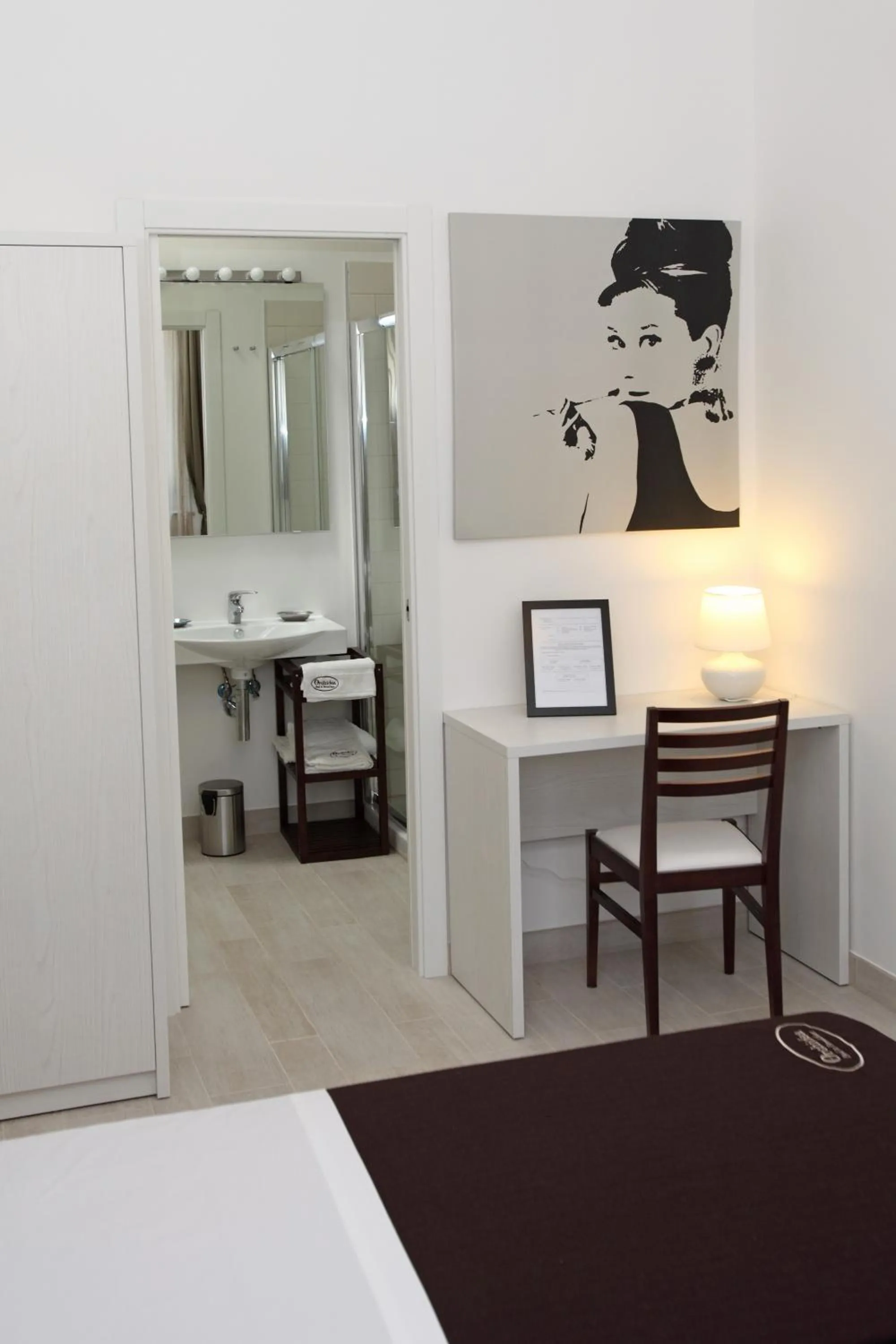 Bedroom in Orchidea Rooms & Suites