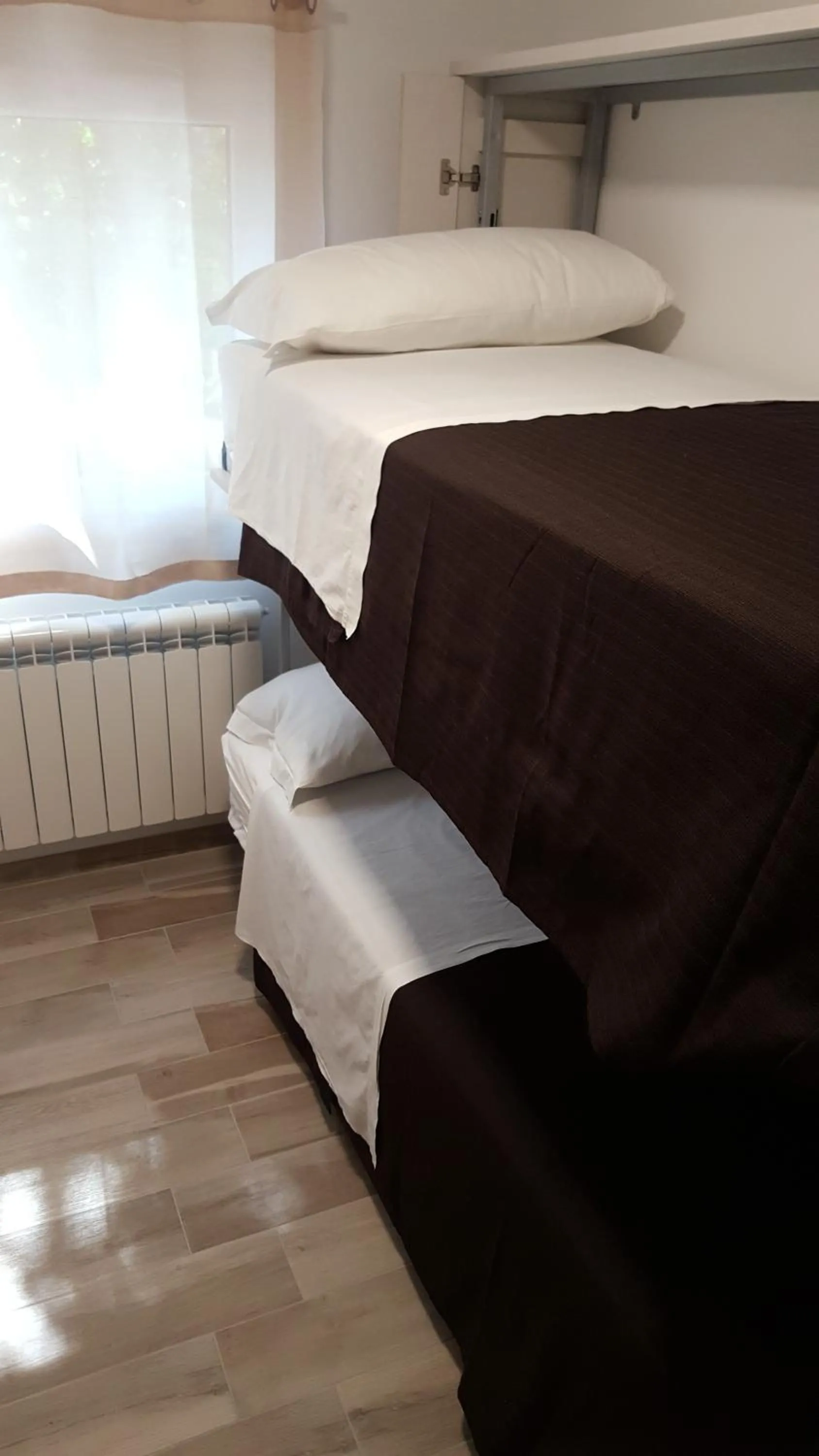 Photo of the whole room in Orchidea Rooms & Suites