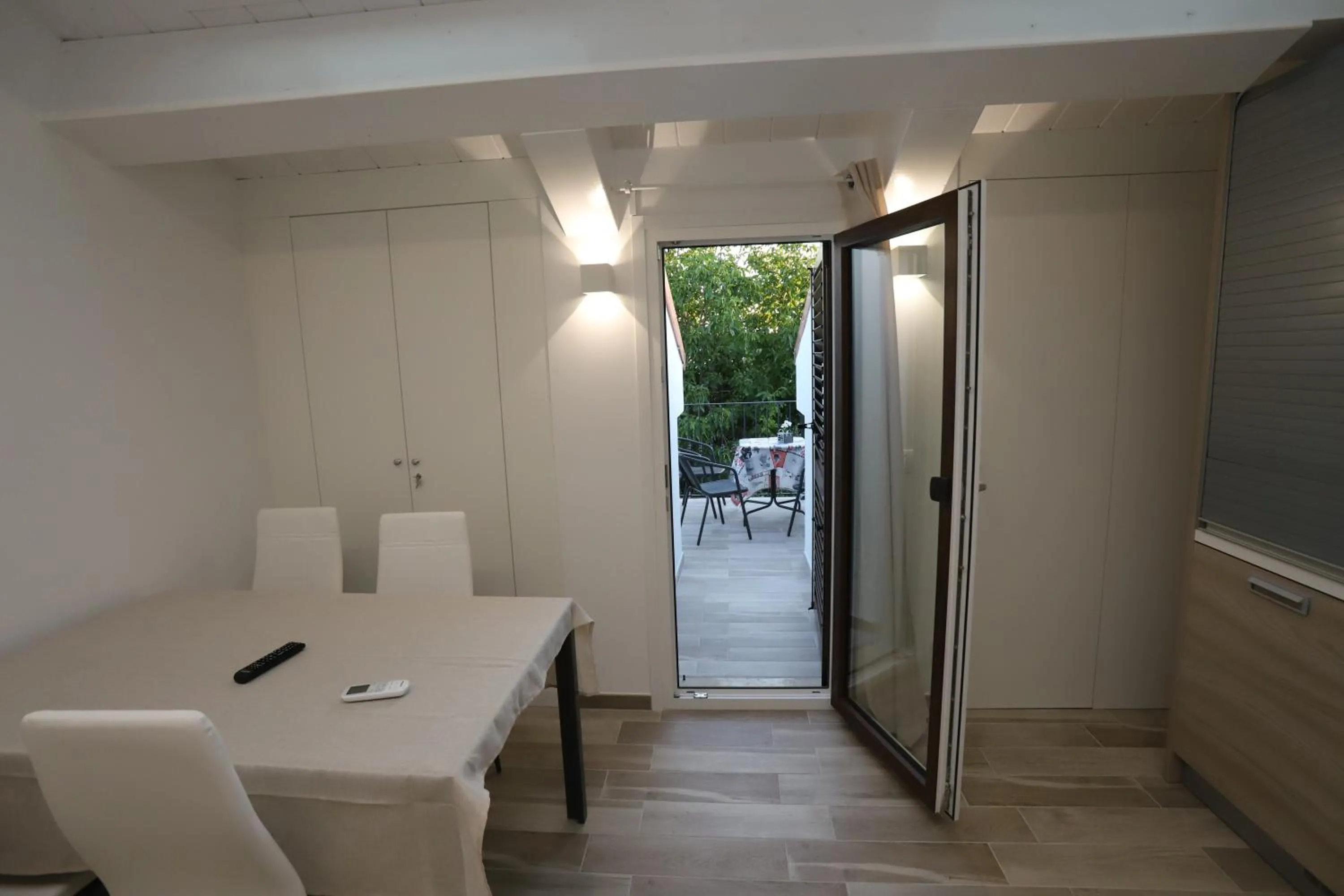 Dining area in Orchidea Rooms & Suites