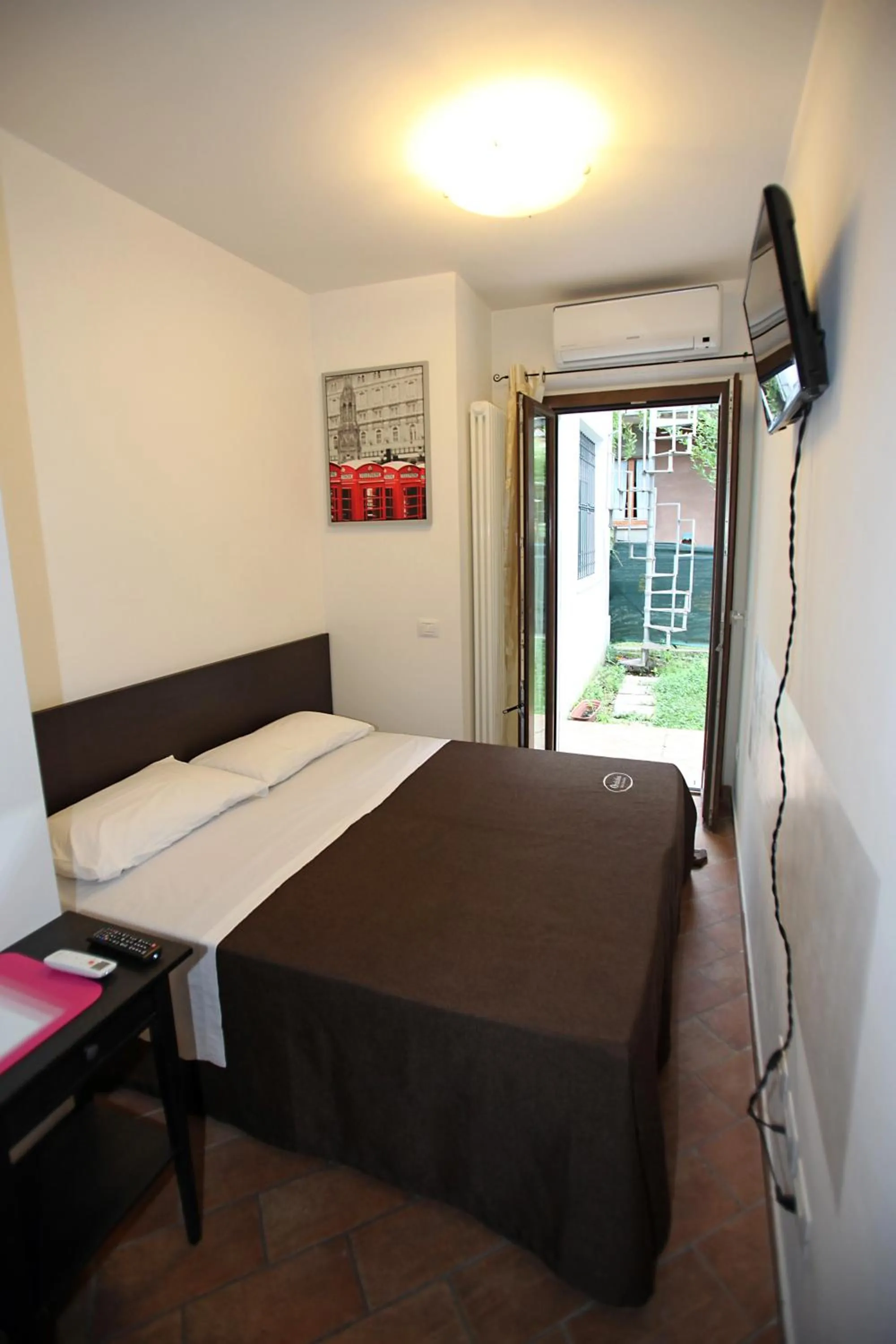 Photo of the whole room, Bed in Orchidea Rooms & Suites