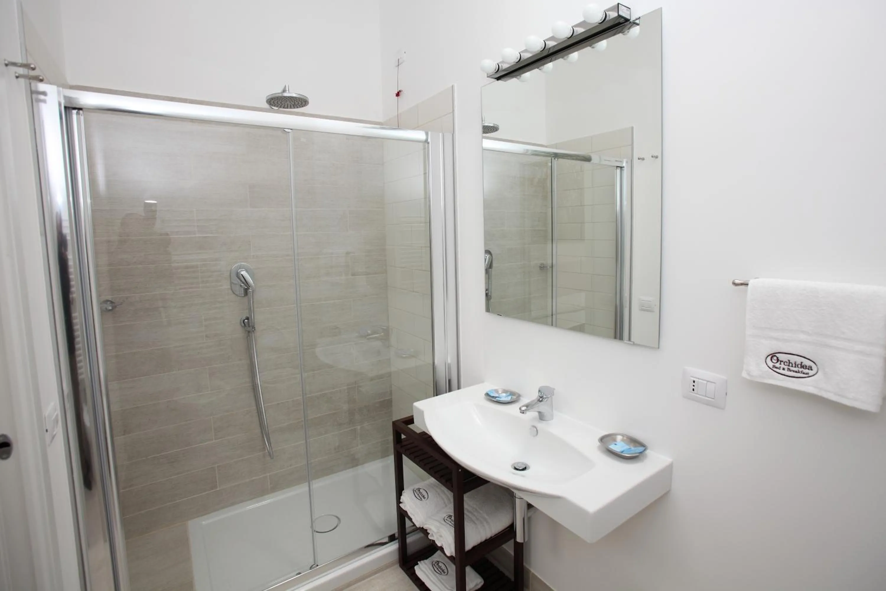 Bathroom in Orchidea Rooms & Suites