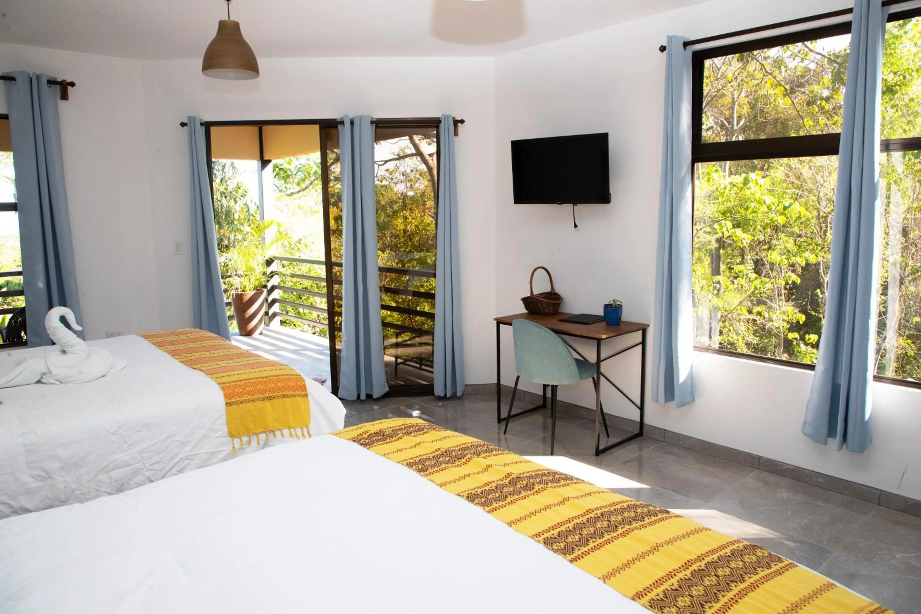 Bed in Jungle Lodge at Wild Sun Rescue Center