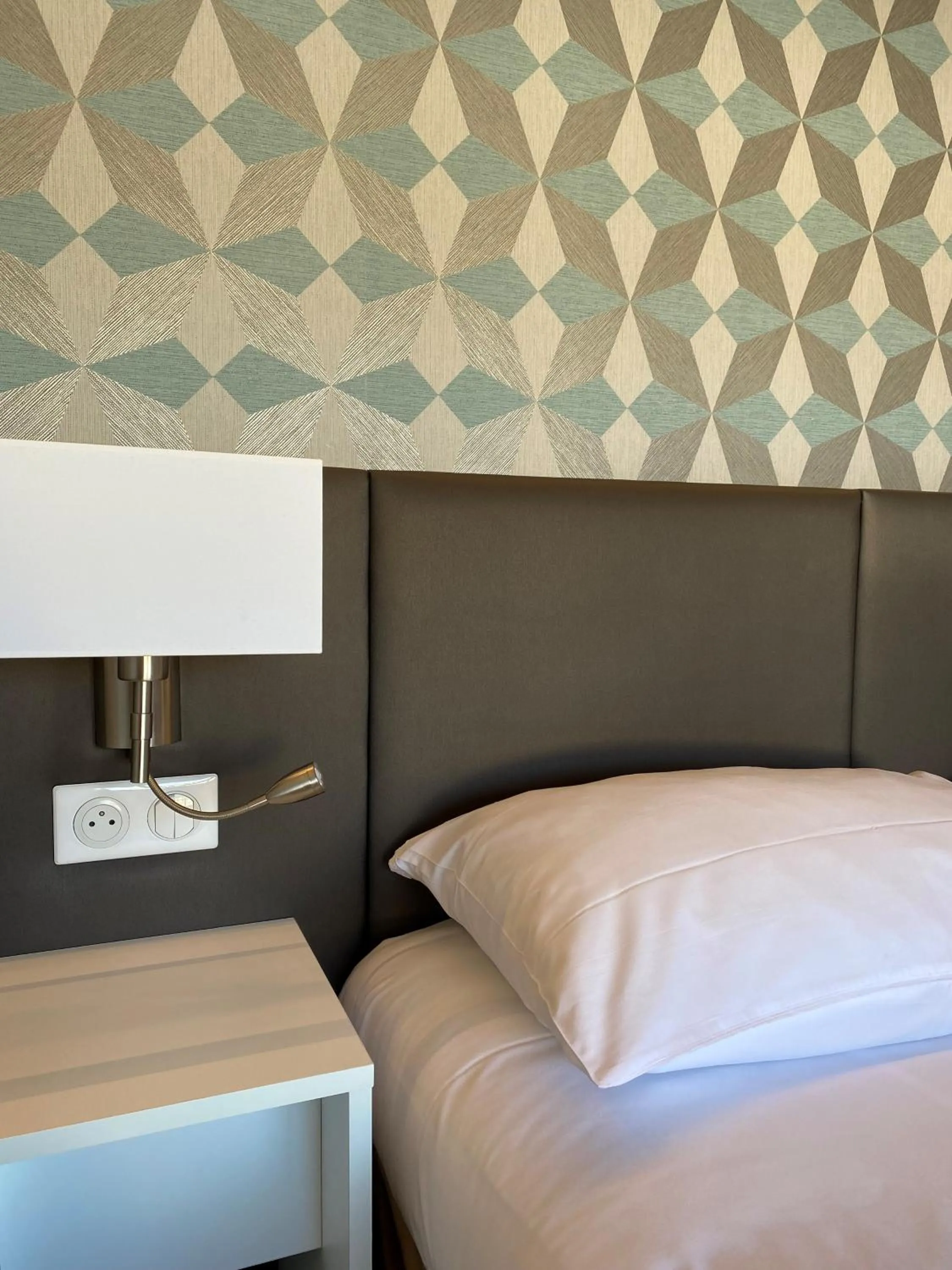 Bed in Mercure Castres L'Occitan