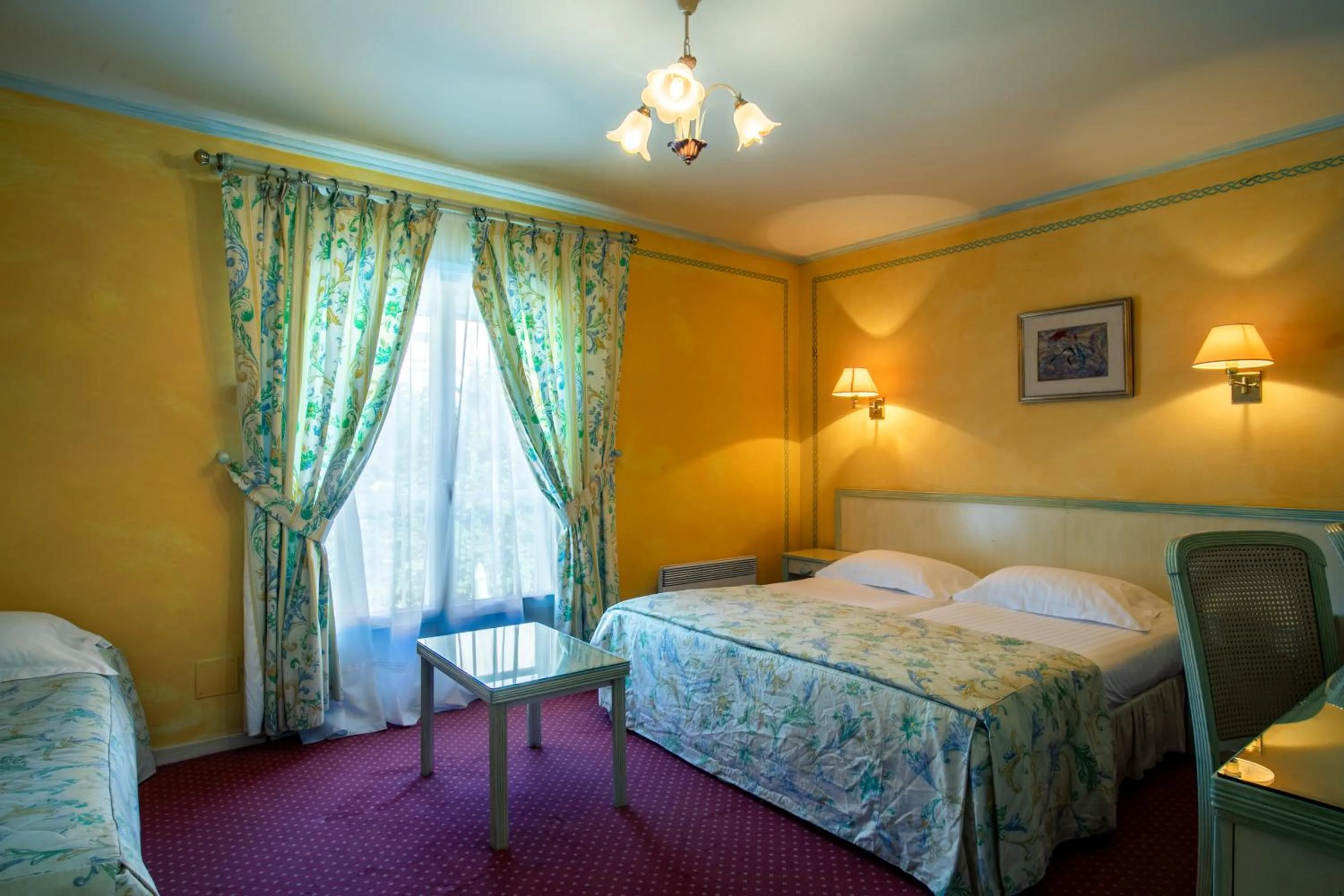 Bed in Hôtel Mireille