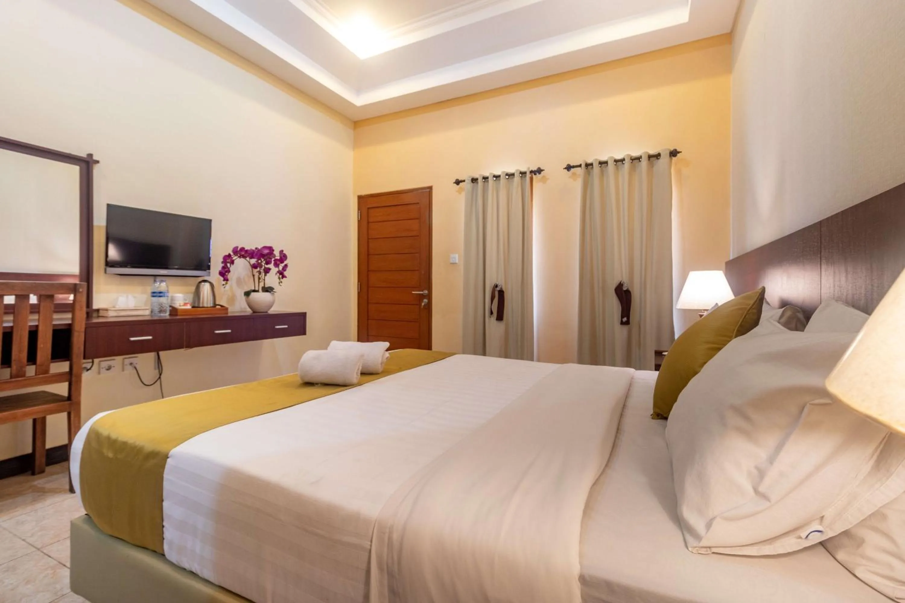 Bed in Segara Agung Boutique Hotel