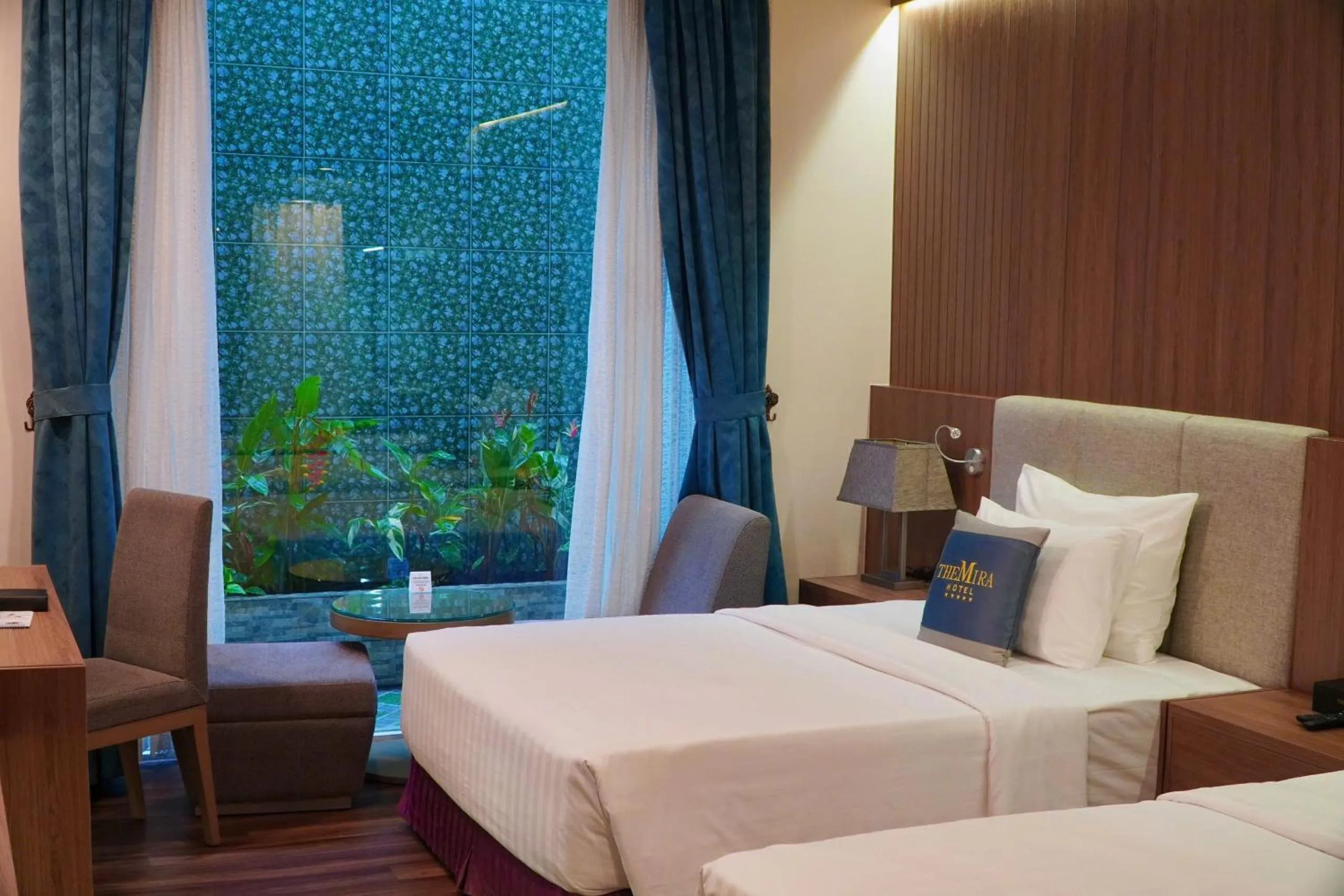 Bed in The Mira Hotel