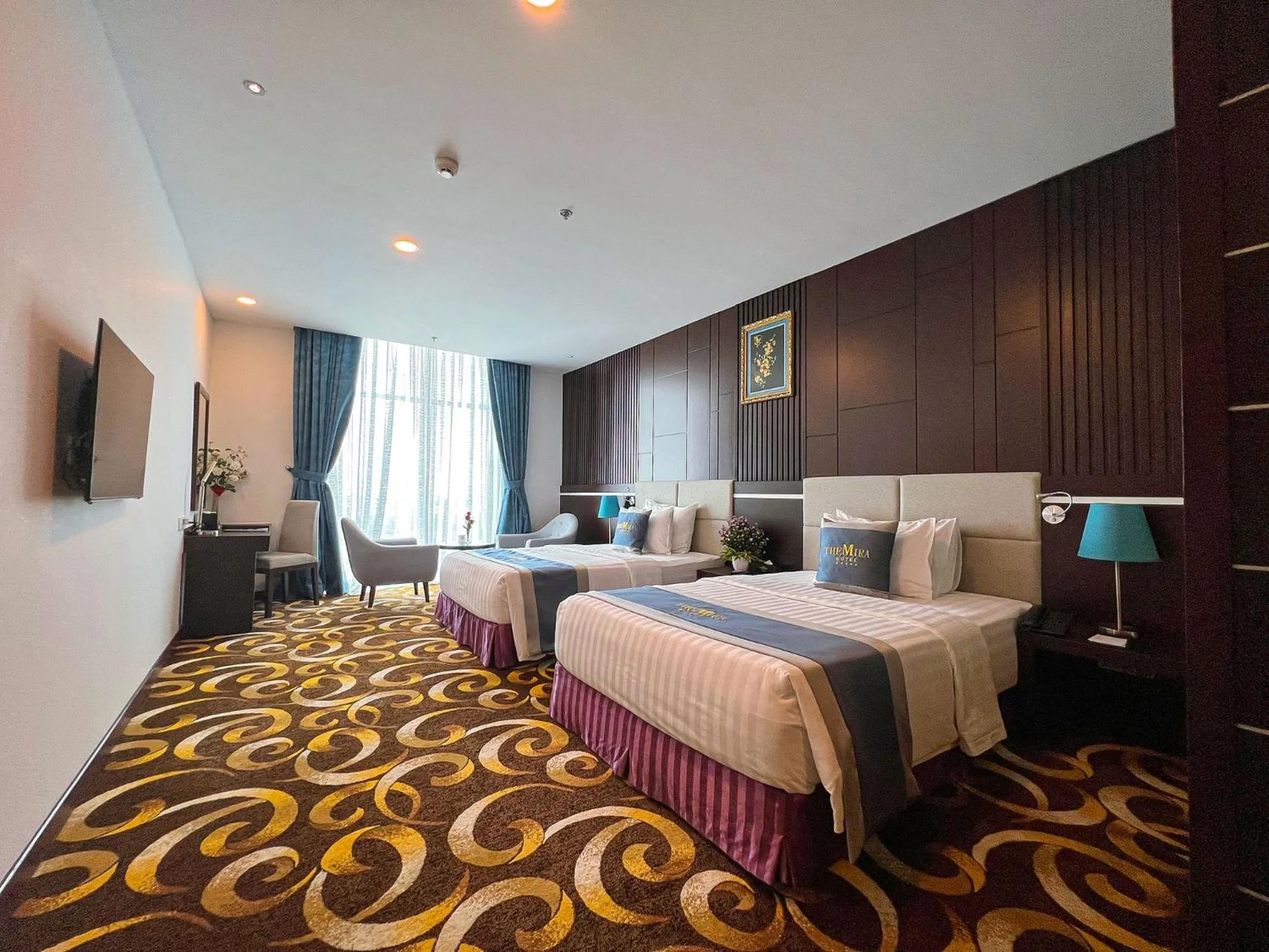 Bed in The Mira Hotel