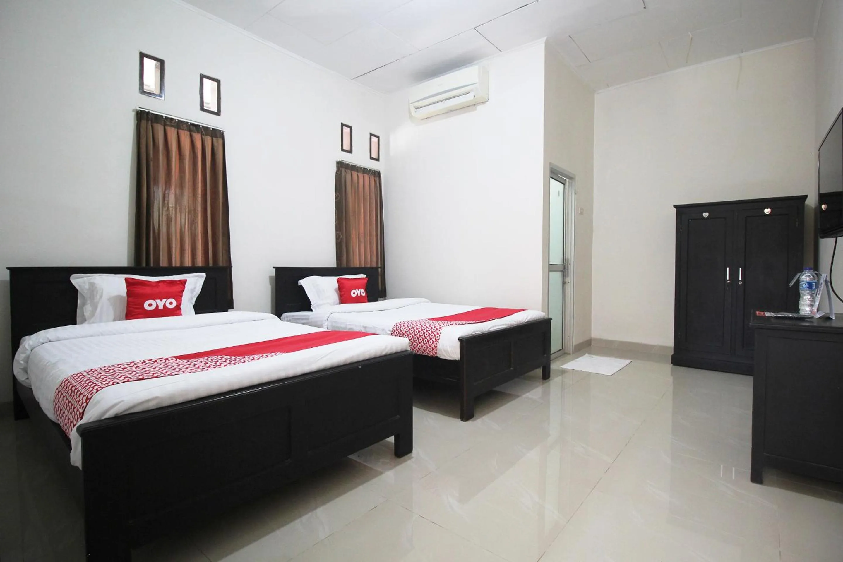 Bedroom, Bed in Hotel O Wisma Ray Syariah
