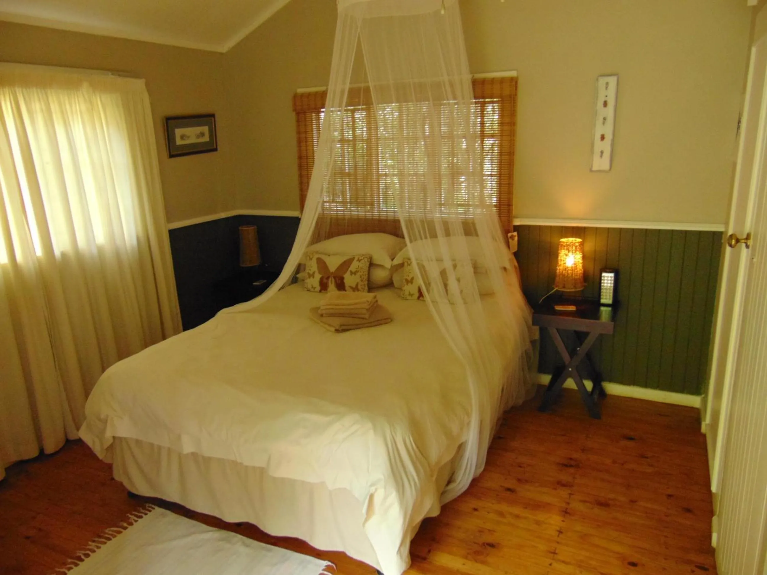 Bed in Fountain Baths Guest Cottages
